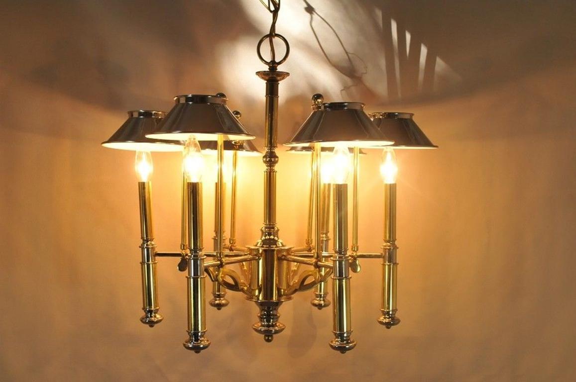 Vintage Lightolier chrome and brass Art Deco style Mid-Century Modern chandelier with six lights and adjustable shades, circa 1970s. Measurements: 22