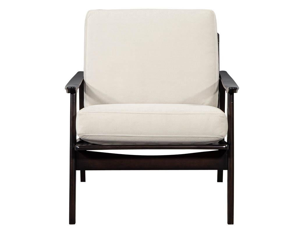 Vintage Mid-Century Modern lounge chair. Fully restored in a hand rubbed ebony finish and reupholstered in a designer velvet covering.

Price includes complimentary scheduled curb side delivery service to the continental USA.