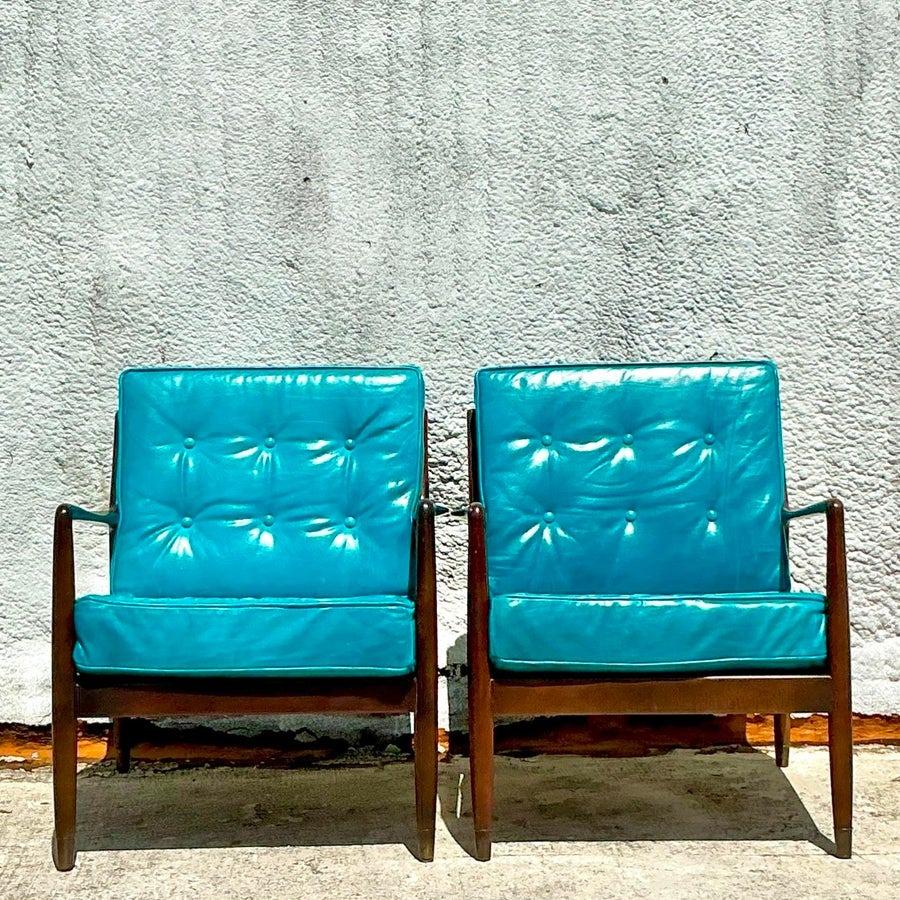 Mid-Century Modern Paire de fauteuils de salon vintage modernes du milieu du siècle dernier d'après Dux en vente