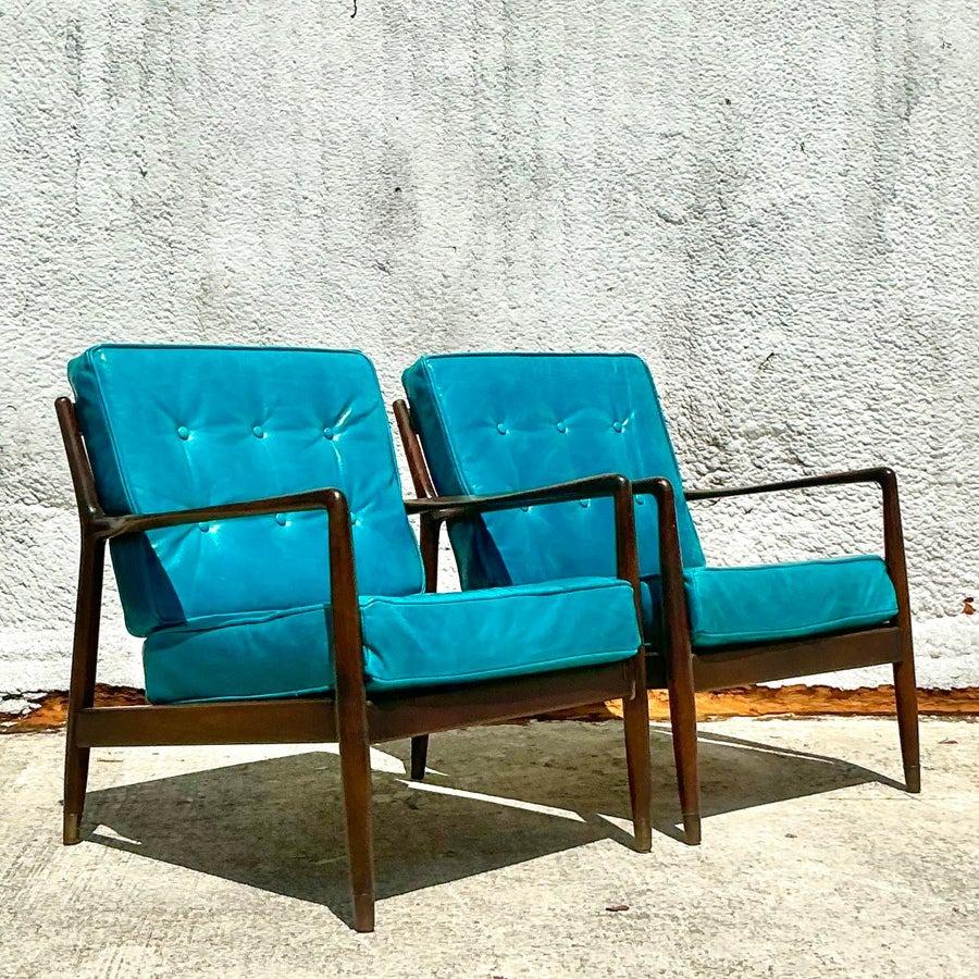 Cuir Paire de fauteuils de salon vintage modernes du milieu du siècle dernier d'après Dux en vente