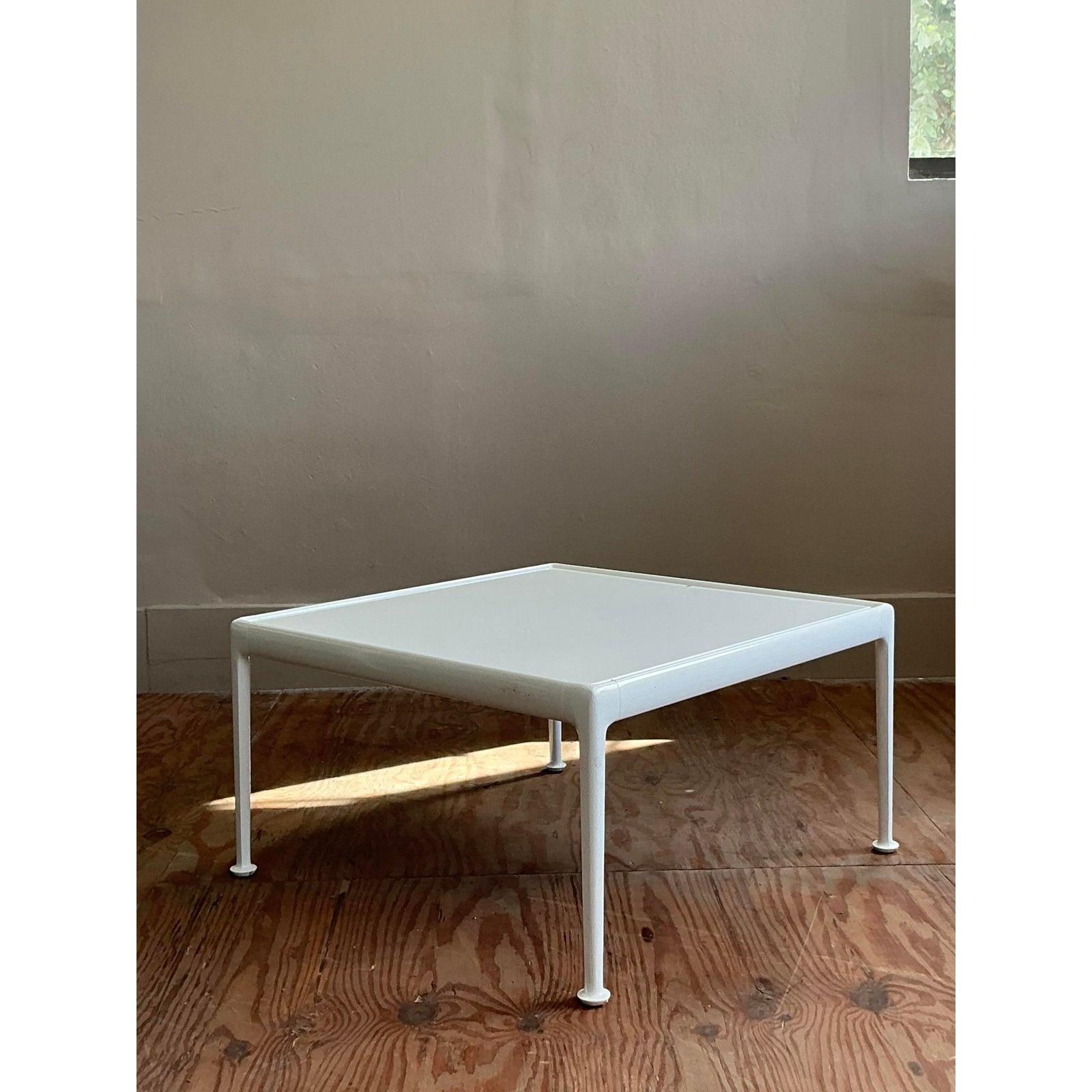 A superb example of Mid-Century Modern architectural design, this vintage low table is a tribute to the minimalist ethos of legendary designer Richard Schultz. Expertly constructed from durable metal with a sleek white finish, its clean lines and