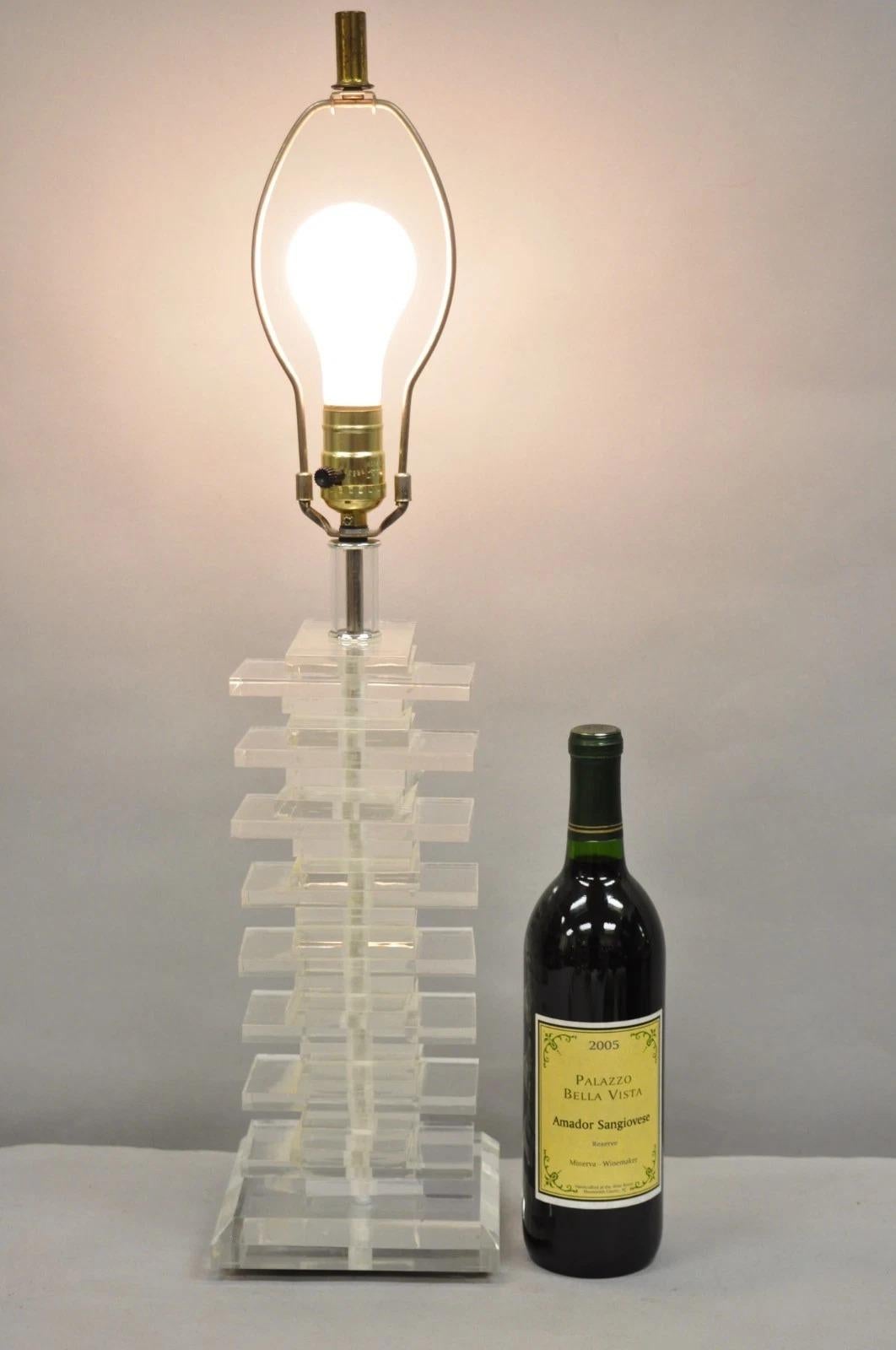 Vintage Mid Century Modern Lucite Acrylic Stacked Skyscraper Table Lamp. Circa Late 20th Century. Measurements: 26