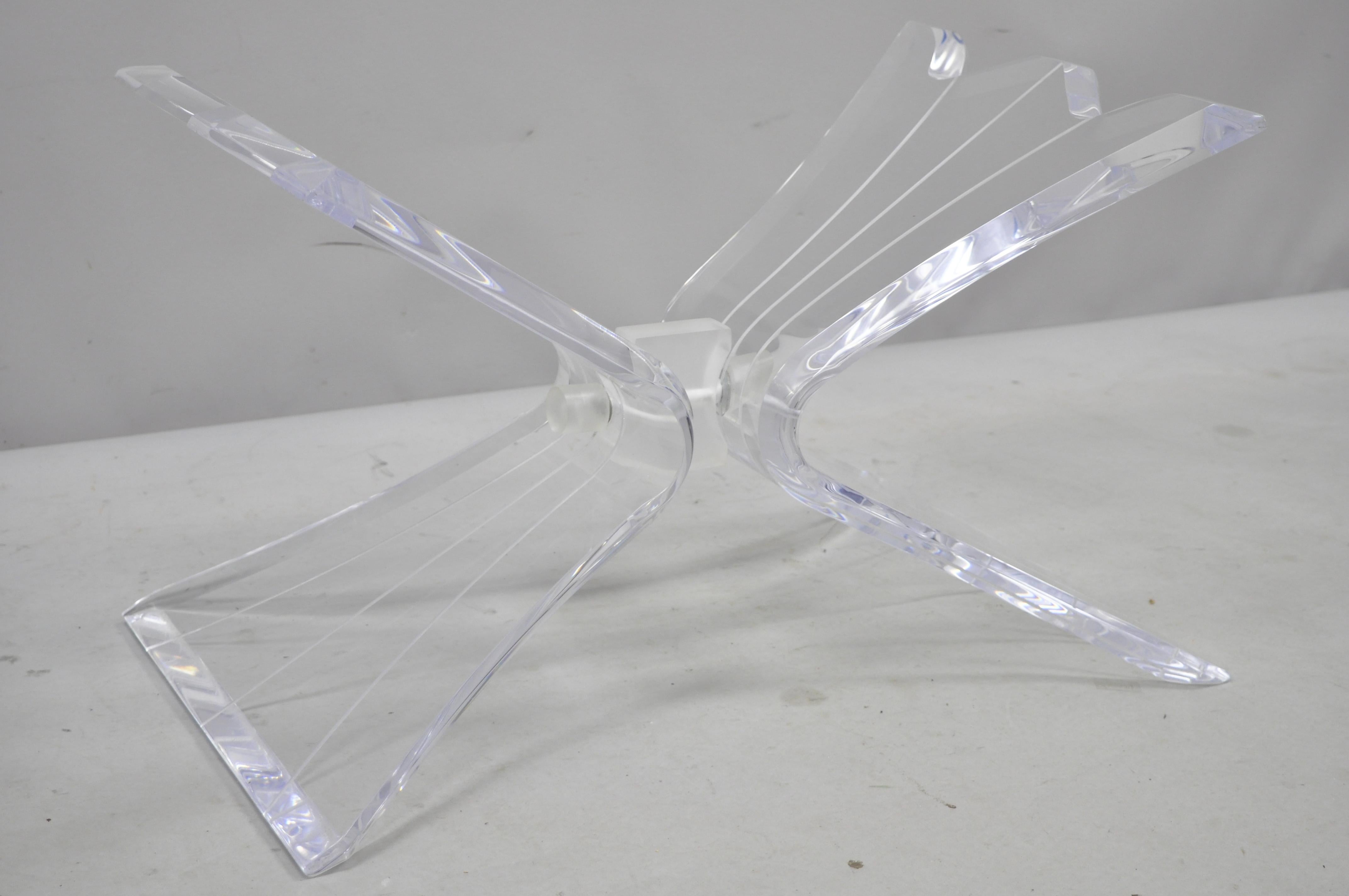 Vintage Mid-Century Modern Lucite butterfly lion in frost style coffee table. Item includes sculptural Lucite butterfly base, very nice vintage item, sleek sculptural form,
circa mid-20th century. Measurements: 16