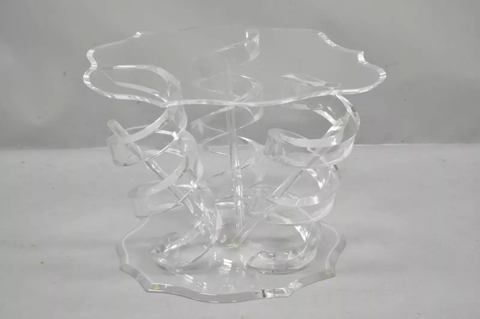 Vintage Mid Century Modern Lucite Spiral Coil Curly Cue Side Table Coffee Table. Item features a shapely lucite top, spiral coil springs, triple pedestal base, lucite rod 