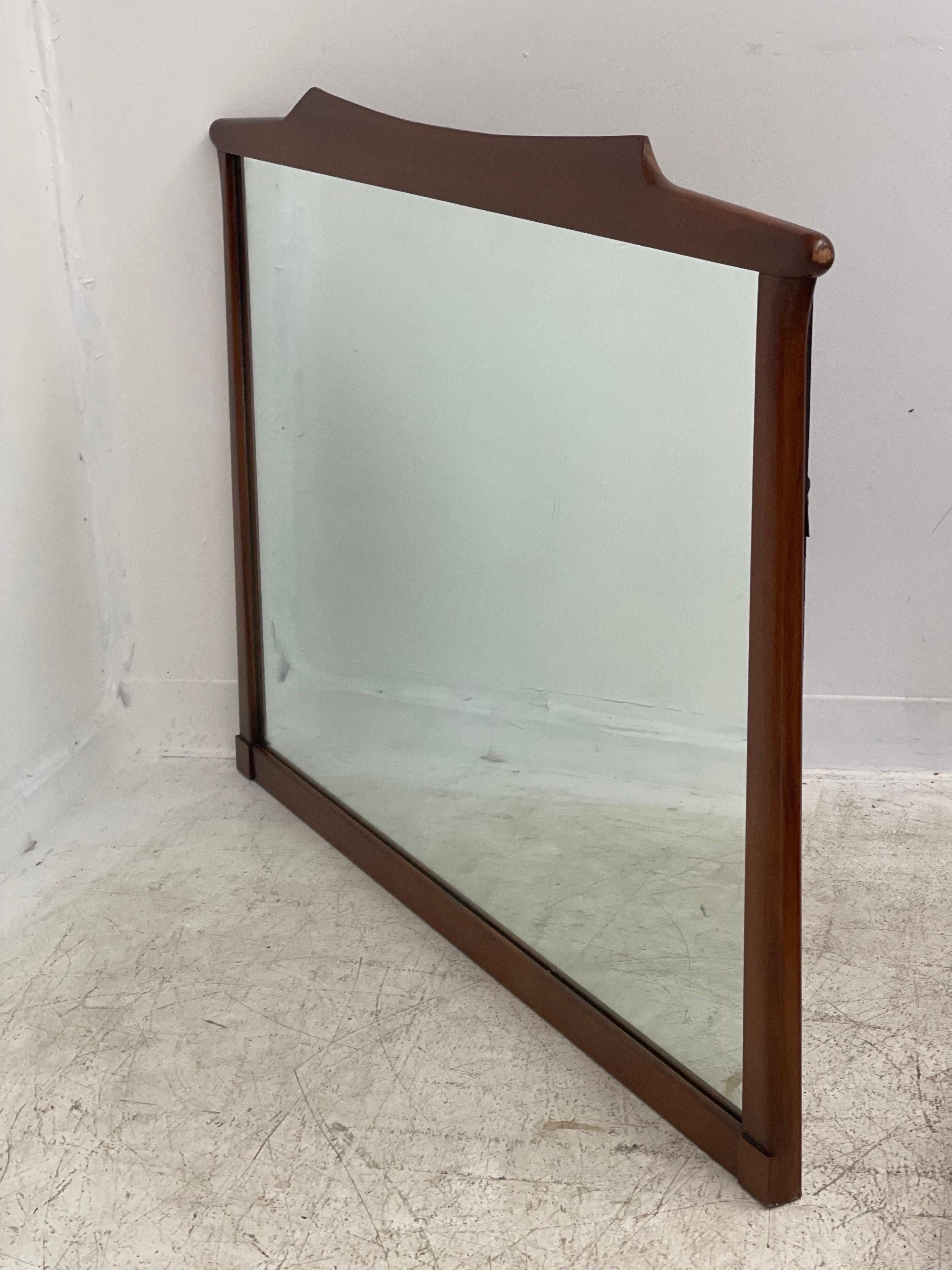 Vintage Mid-Century Modern mirror 

Dimensions. 46 W ; 32 H ; 2 D.