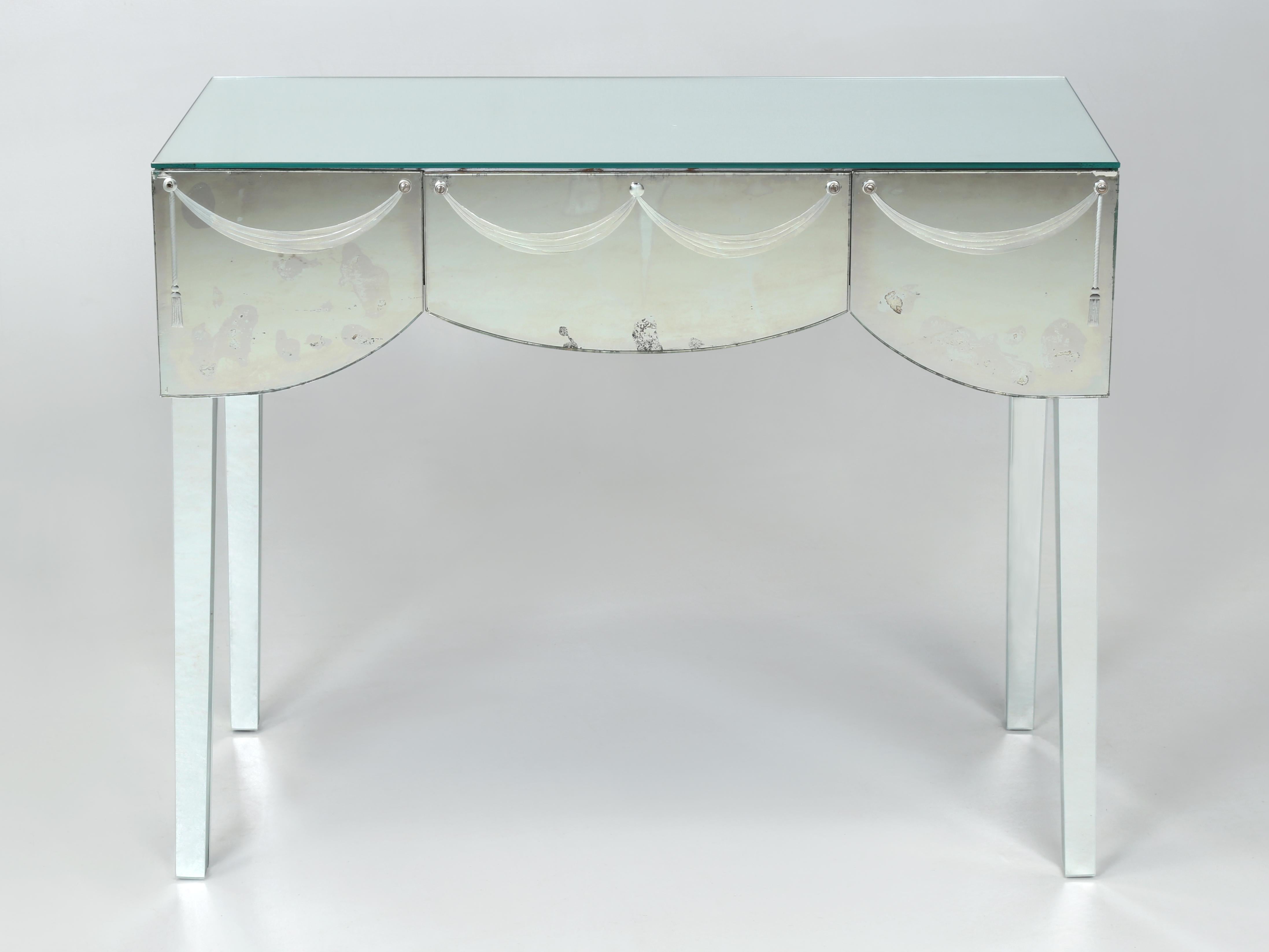 Vintage Mirror Clad Bathroom Vanity Dressing Table or Mirrored Console Table probably made in the 1960's. For over the past 30-years we have always sought out and purchased mirrored clad furniture, whether it was Italian or American or whatever it