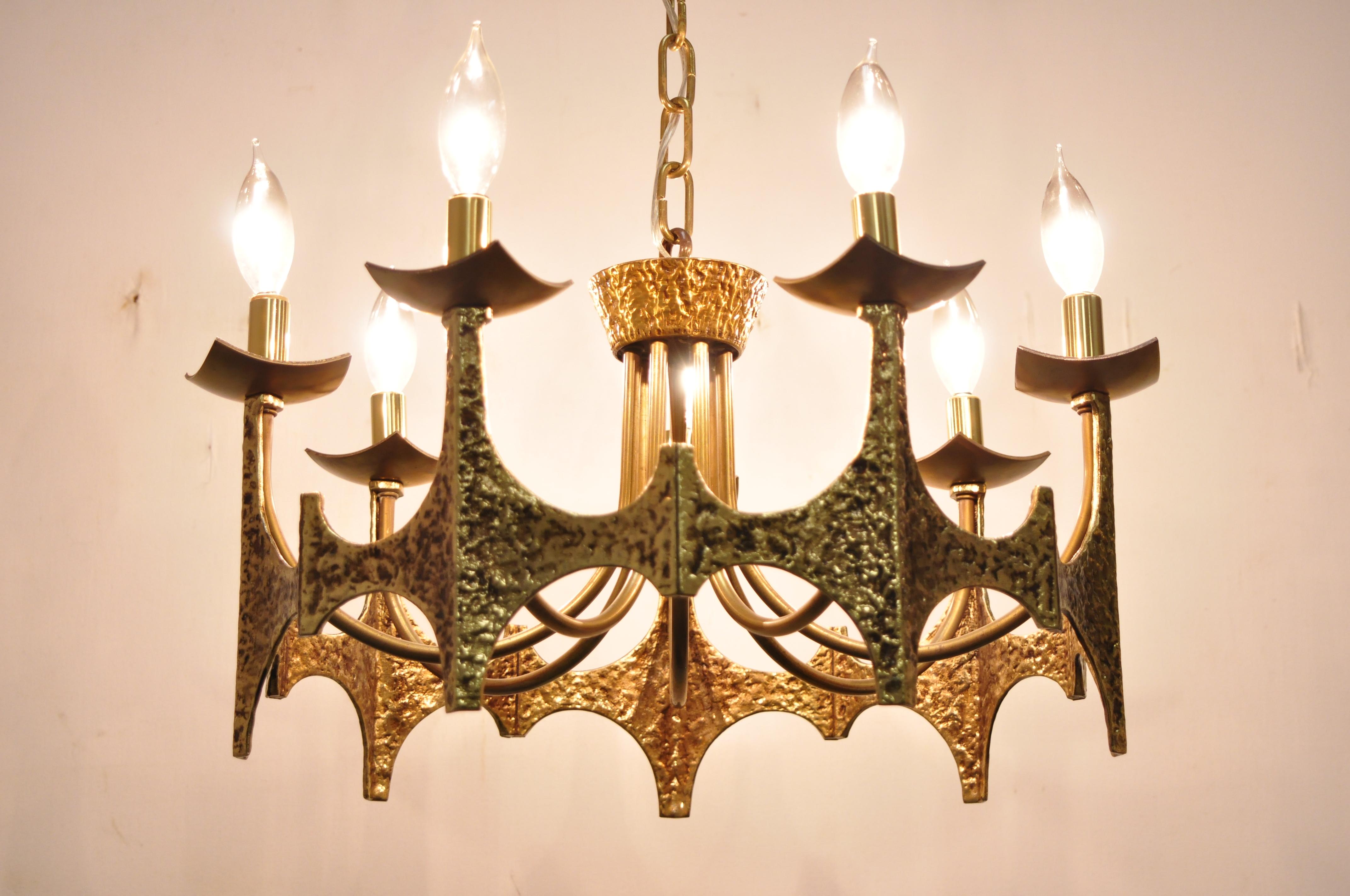 Vintage Mid-Century Modern Mo Bridges Brutalist hammered brass chandelier. Item features (7) lights, unique Brutalist design, intentional distressed finish, very nice vintage item, great style and form, circa mid-20th century. Measurements: 12