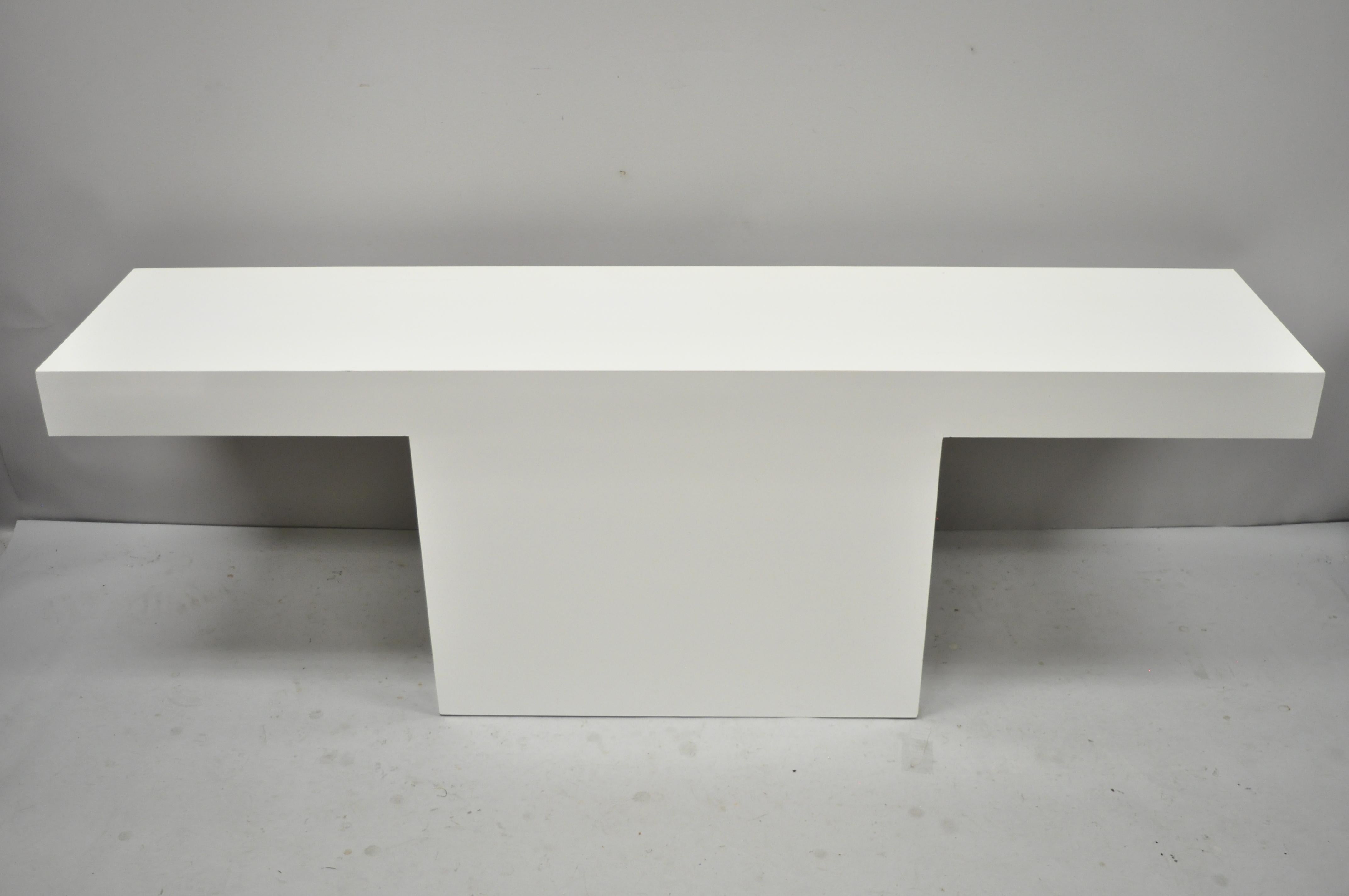 Vintage Mid-Century Modern modernist white laminate Formica console sofa table. Item features laminate / Formica wrapped frame, very nice vintage item, clean modernist lines, great style and form, circa 1970s. Measurements: 24