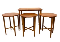 Vintage Mid-Century Modern Nesting Table Set with Three Round Stowaway Stools