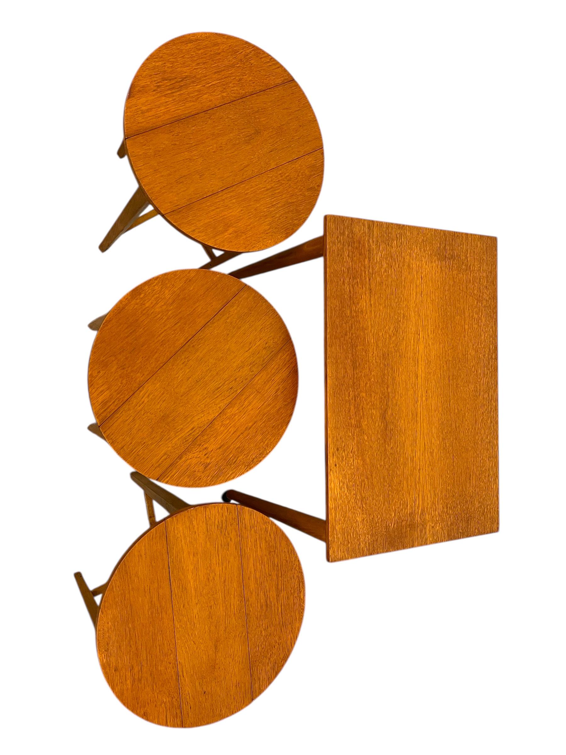 Mid-Century moderno Vintage Mid-Century Modern Nesting Table Set with Three Round Stowaway Stools in vendita