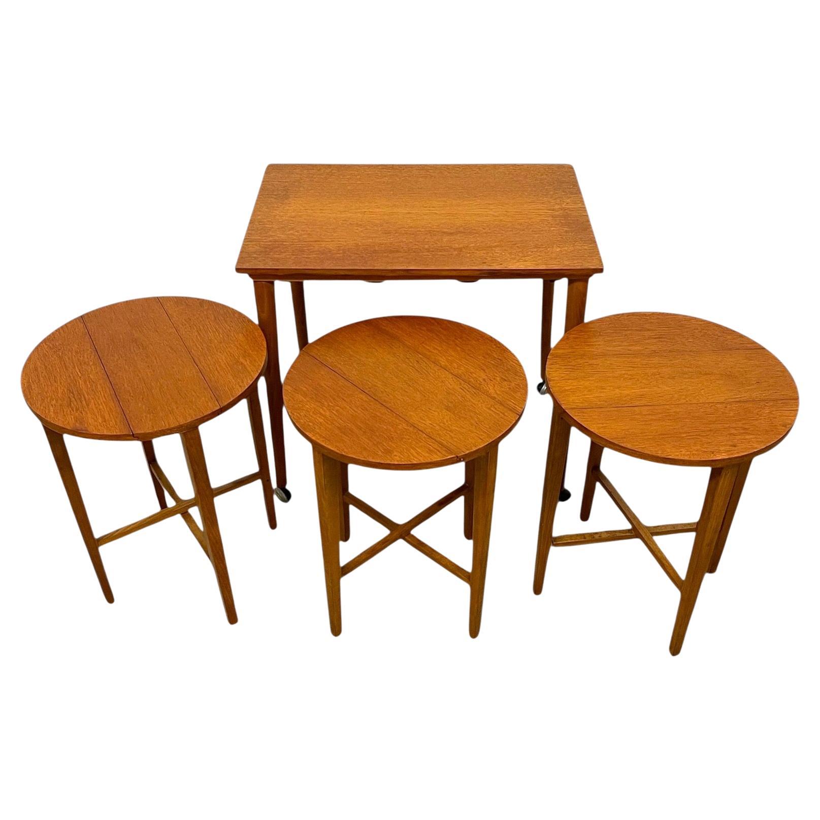 Vintage Mid-Century Modern Nesting Table Set with Three Round Stowaway Stools