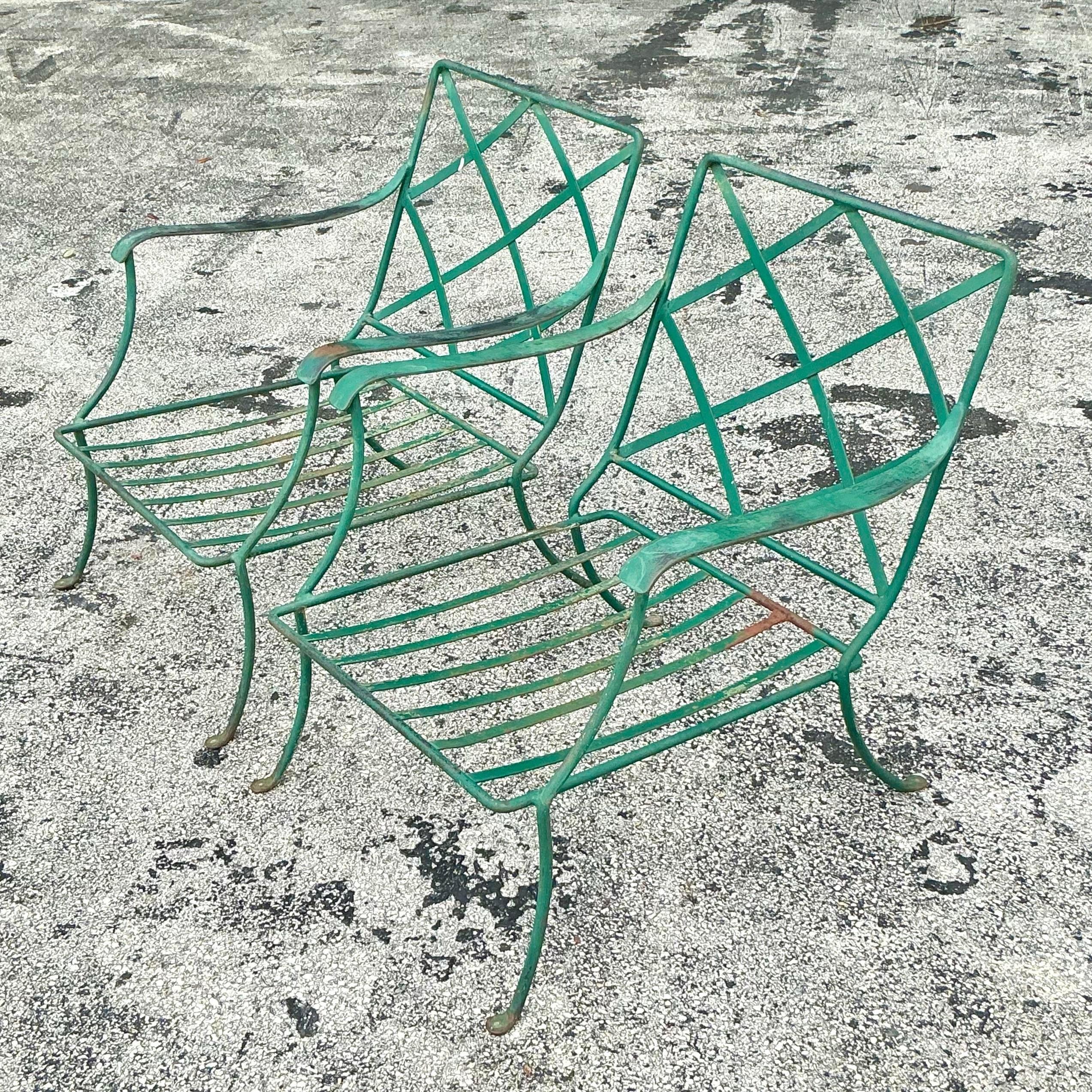 Elevate your outdoor or indoor space with this set of 3 vintage MCM wrought iron lounge chairs. Sleek and durable, they offer a timeless modernist design perfect for lounging in style.

Ottoman - 23.75x23x15.5