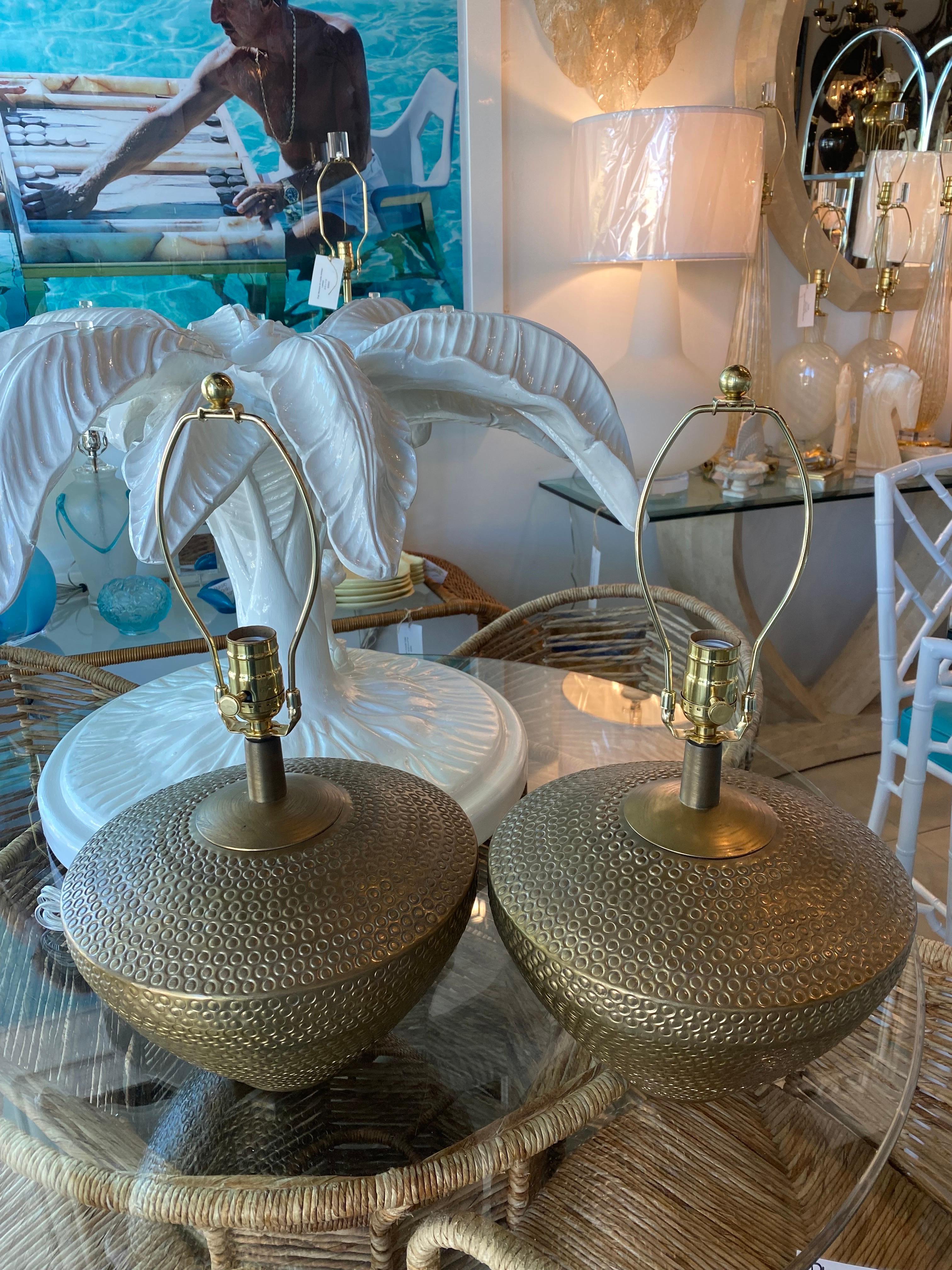 Vintage Pair of brass table lamps. These have been newly wired, all new brass hardware, 3 way sockets. Dimensions: 13 H (to top of socket) x 19 H (to top of finial) x 12 D.