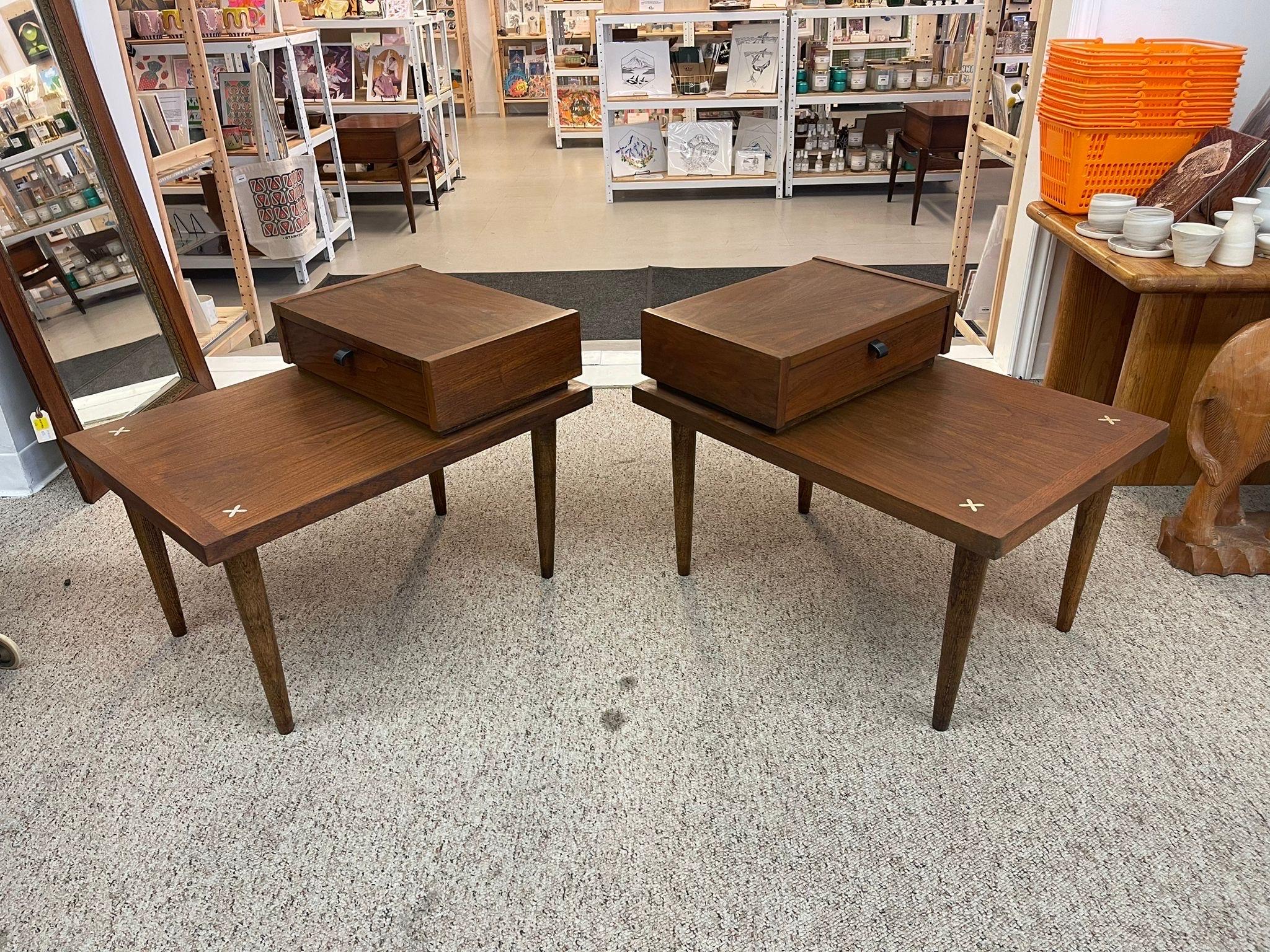 Silver toned metal inlays accent the top of this set. Walnut toned wood, with tapered legs. Metal pull handle to the single dovetailed dresser. Vintage Condition Consistent with Age as Pictured.

Dimensions. 28 W ; 20 D ; 21 1/2 H