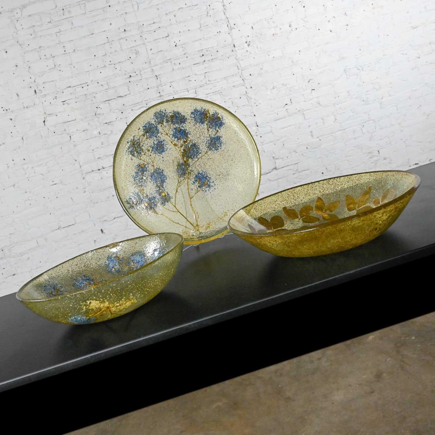Lovely vintage mid-century modern pair of transparent goldish molded pliable plastic bowls and a tray with blue flowers & gold stems, gold leaves, and gold glitter or gilt flecks. Beautiful condition, keeping in mind that these are vintage and not
