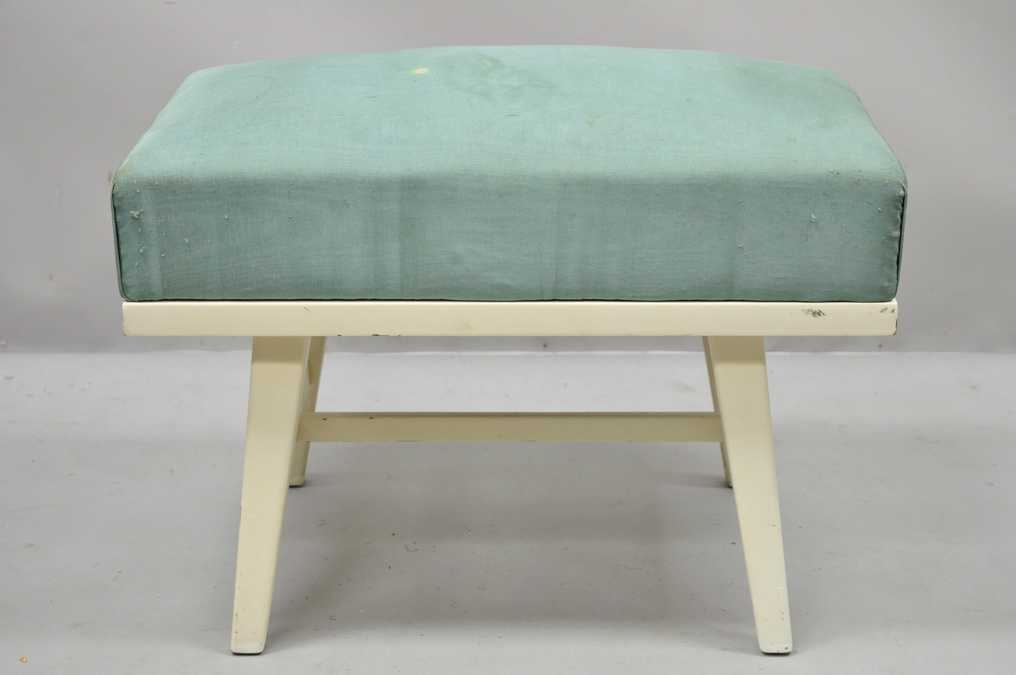 Vintage Mid-Century Modern Paul McCobb style ottoman stool by Herald Furniture Co. Item features solid wood frame, original label, tapered legs, very nice vintage item, great style and form, Circa mid 20th century. Measurements: 18