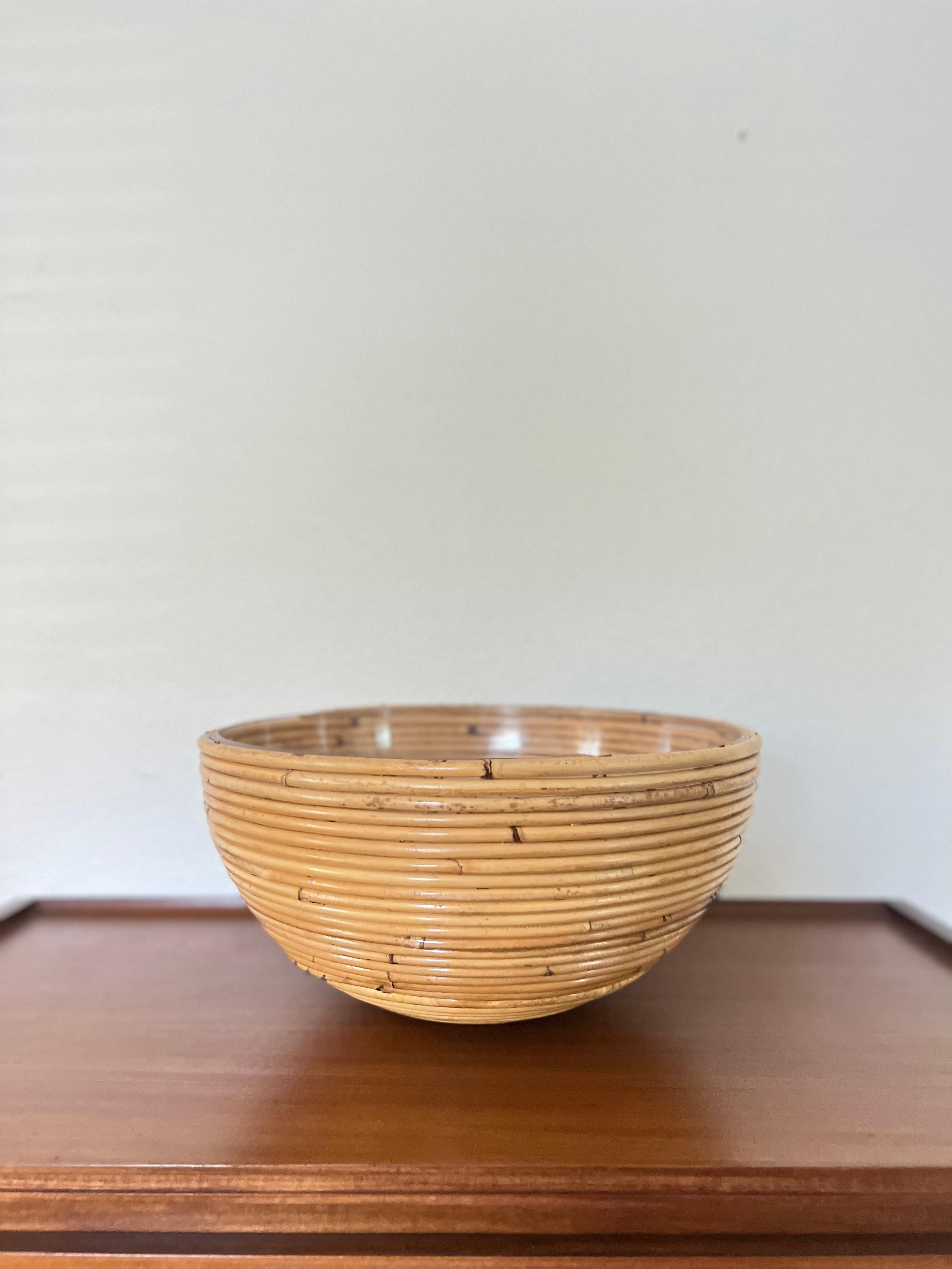 Beautiful vintage Mid-Century Modern pencil reed decorative bowl. Comes with a plastic insert.