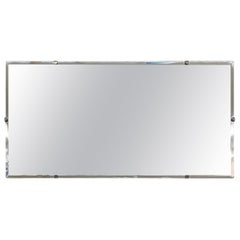 Vintage Mid-Century Modern Rectangular Mirror with Beveled Edge and Metal Clips (Miroir rectangulaire vintage du milieu du siècle avec bord biseauté et pinces en métal)
