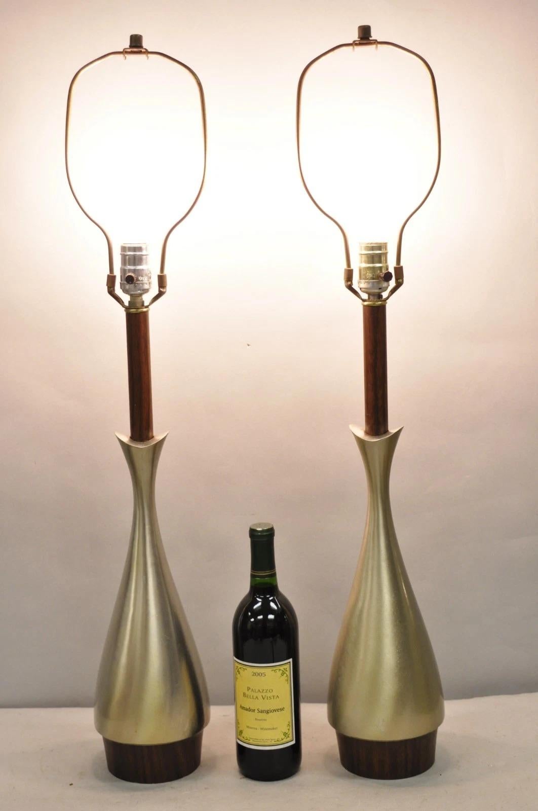 Vintage Mid Century Modern Sculptural Brushed Metal Table Lamps by Laurel - Pair. Circa Mid 20th Century. Dimensions : 33
