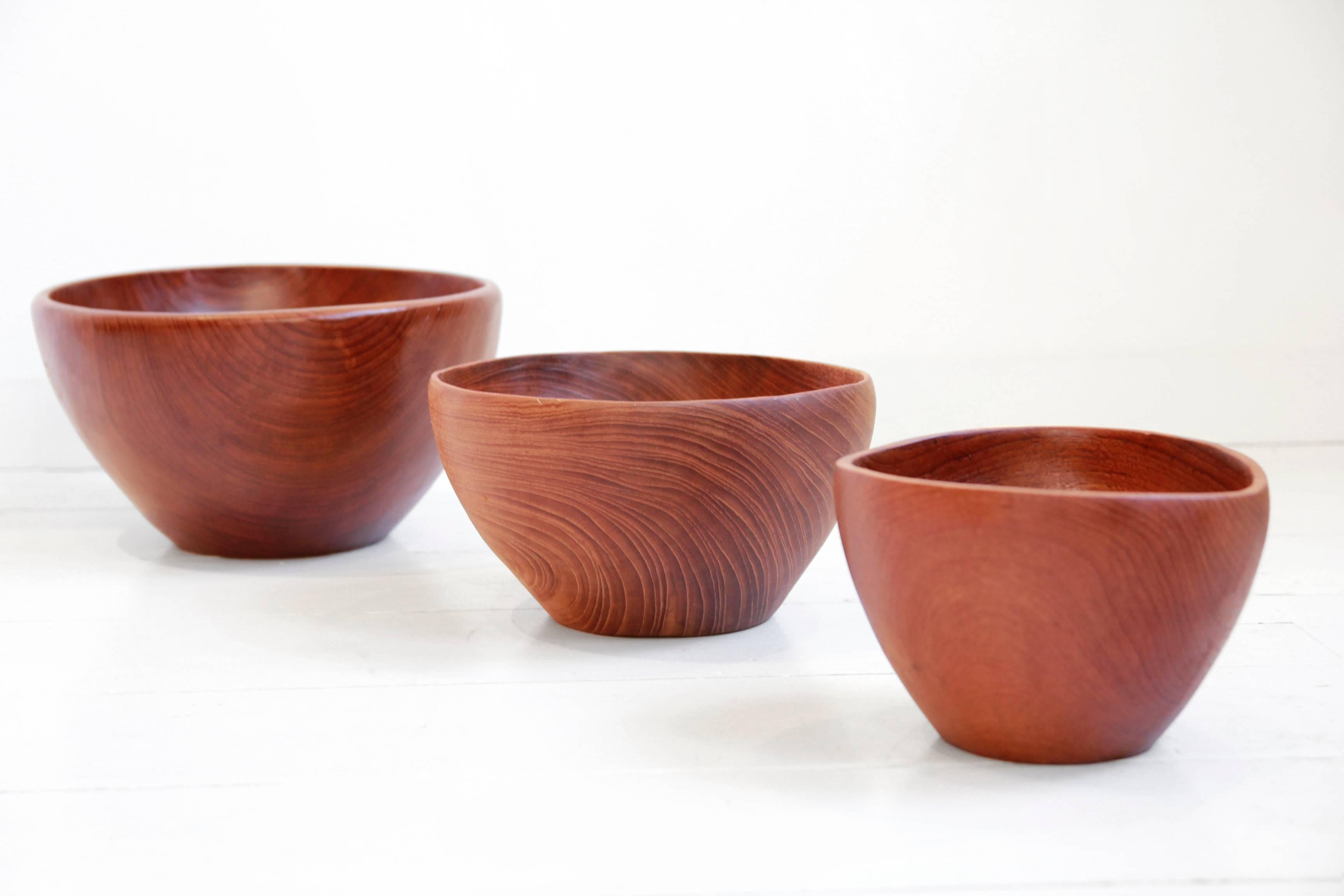Three sculptural teak bowls from Scandinavian origin, from the 1960s.
It is hard to see the size of the bowl in the picture, but in our opinion they are quite large.
The largest bowl has a diameter of 30 cm and a height of 17 cm.
The middle bowl