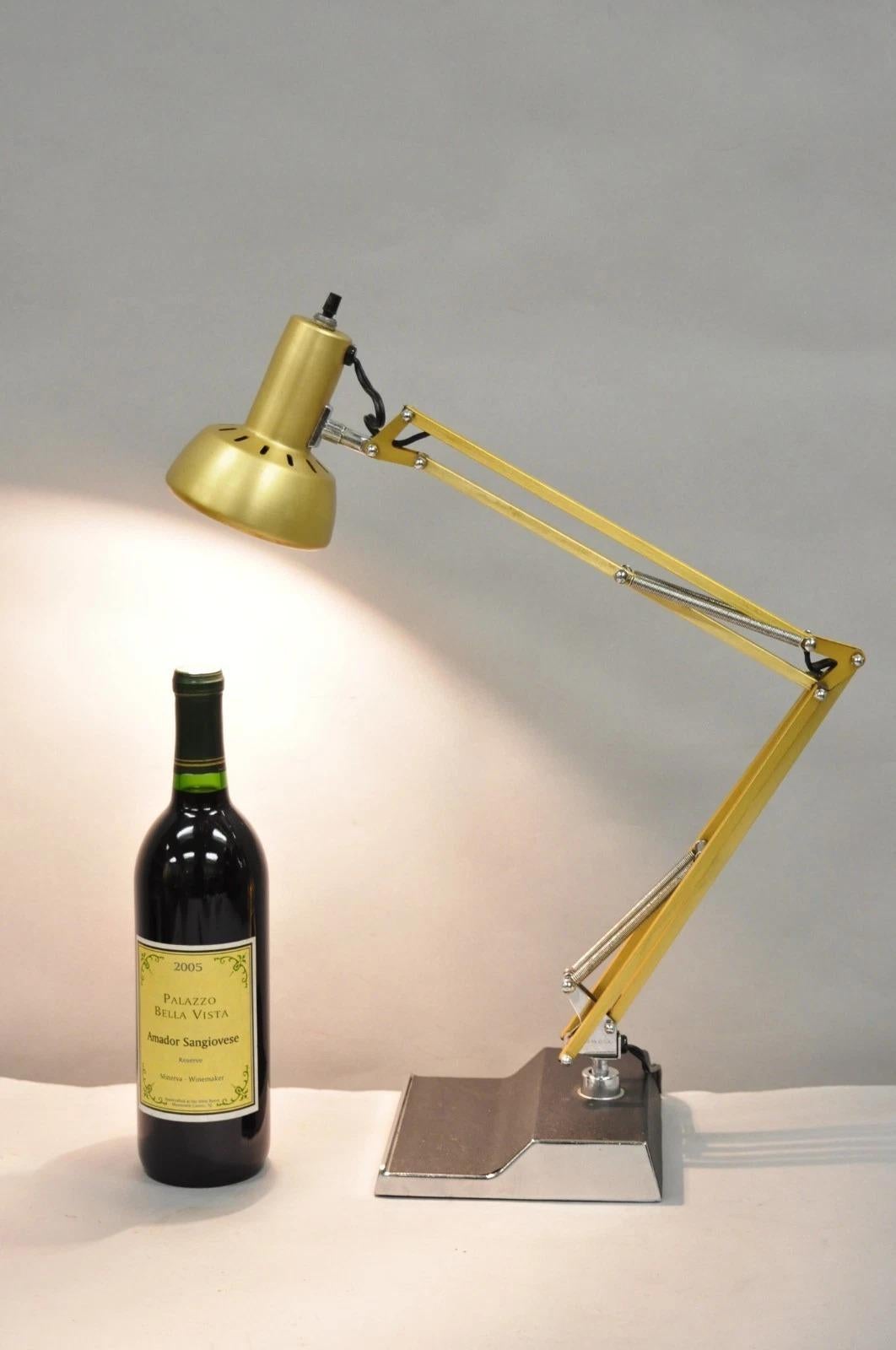 Vintage Mid Century Modern Small Brass Articulating Architects Drafting Desk Lamp by Electrix. Circa Late 20th Century. Measurements: 18