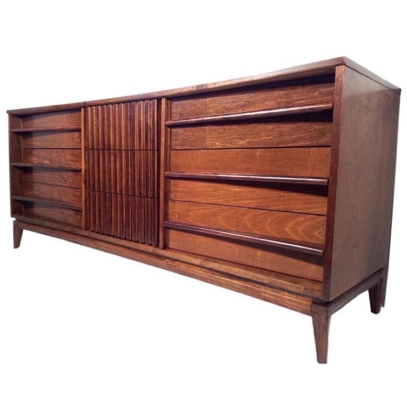 Vintage Mid-Century Modern solid walnut dresser set tallboy and lowboy.

Dimensions. tallboy 41 W ; 20 D ; 54 H
 Lowboy. 72 W ; 20 D ; 30 H.