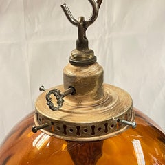 Vintage Mid-Century Modern Spherical Amber Glass Hanging Lamp