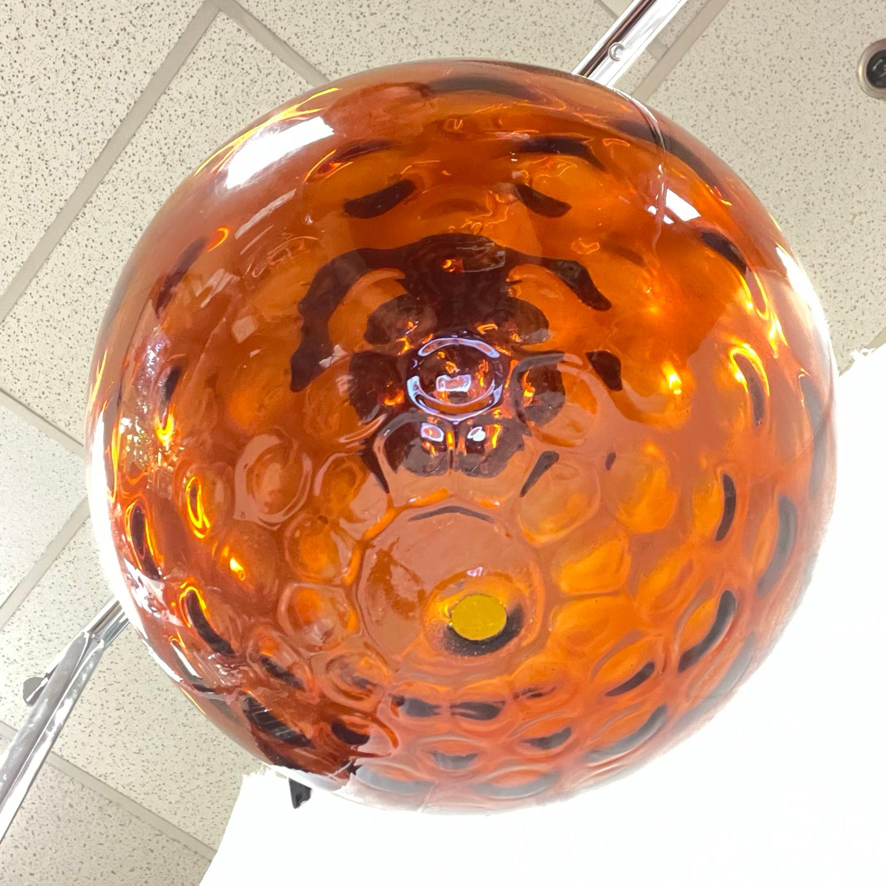 Vintage Mid-Century Modern Spherical Amber Glass Hanging Lamp In Good Condition For Sale In New York, NY