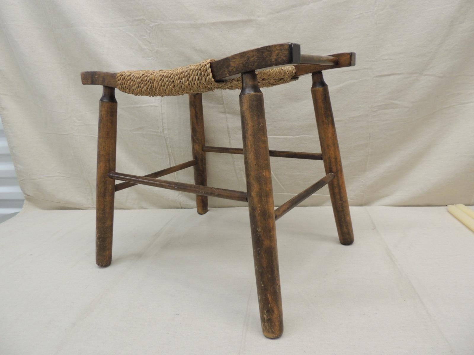 Vintage Mid-Century Modern stool with woven twine seat
round legs and stretchers. aka rush seat.
Size: 19.5