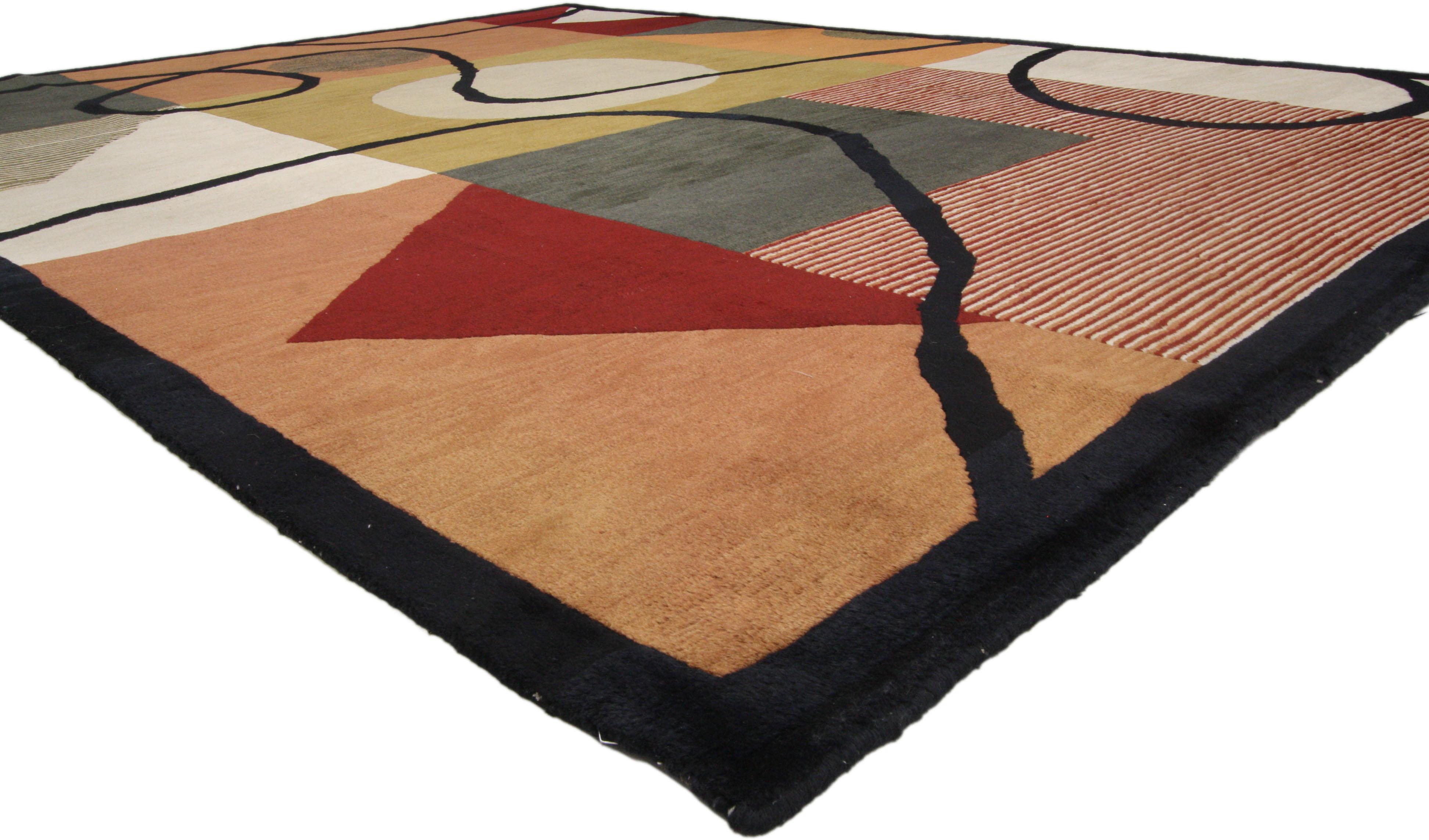 74911, vintage Mid-Century Modern style abstract area rug. Linear and graphic, this hand knotted wool vintage Mid-Century Modern style rug features a modernized hard-edge cubism style with Abstract Expressionism. The field of earth-toned shapes and