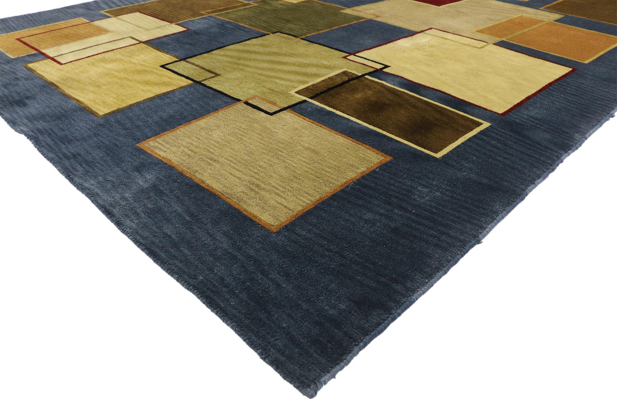 77242 Vintage Mid-Century Modern Style Rug with Cubism and Bauhaus Design 08'04 x 11'06. This hand knotted wool vintage Tibetan Art Deco style rug features a striking design composed of a variety of colorful overlapping rectangles and squares set