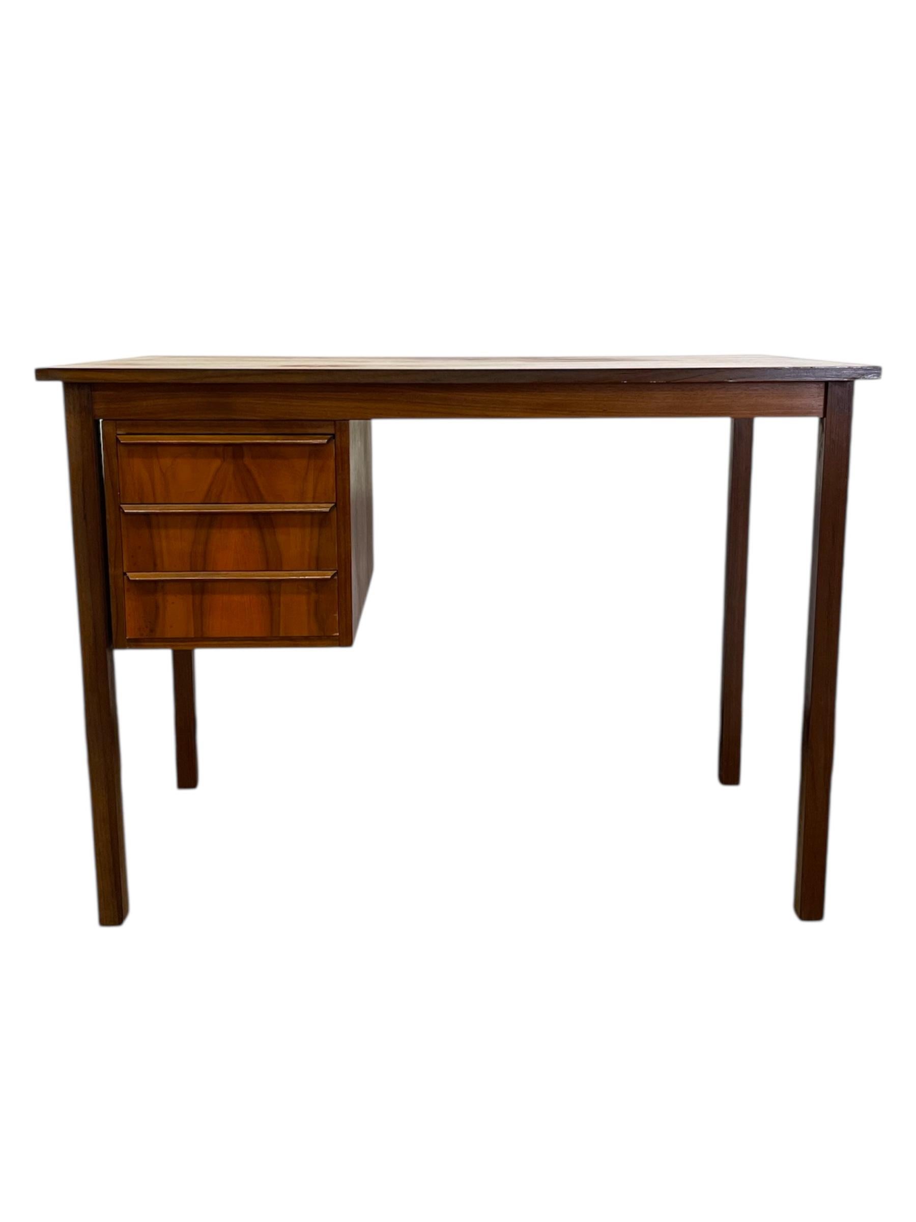 Vintage Mid-Century Modern Teak Desk with Sculpted Handles. Made in Denmark. In Good Condition For Sale In Seattle, WA