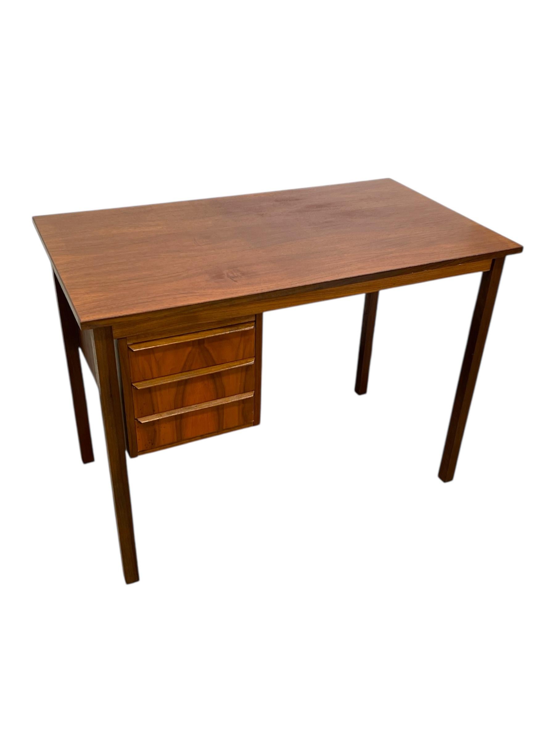 Mid-20th Century Vintage Mid-Century Modern Teak Desk with Sculpted Handles. Made in Denmark. For Sale