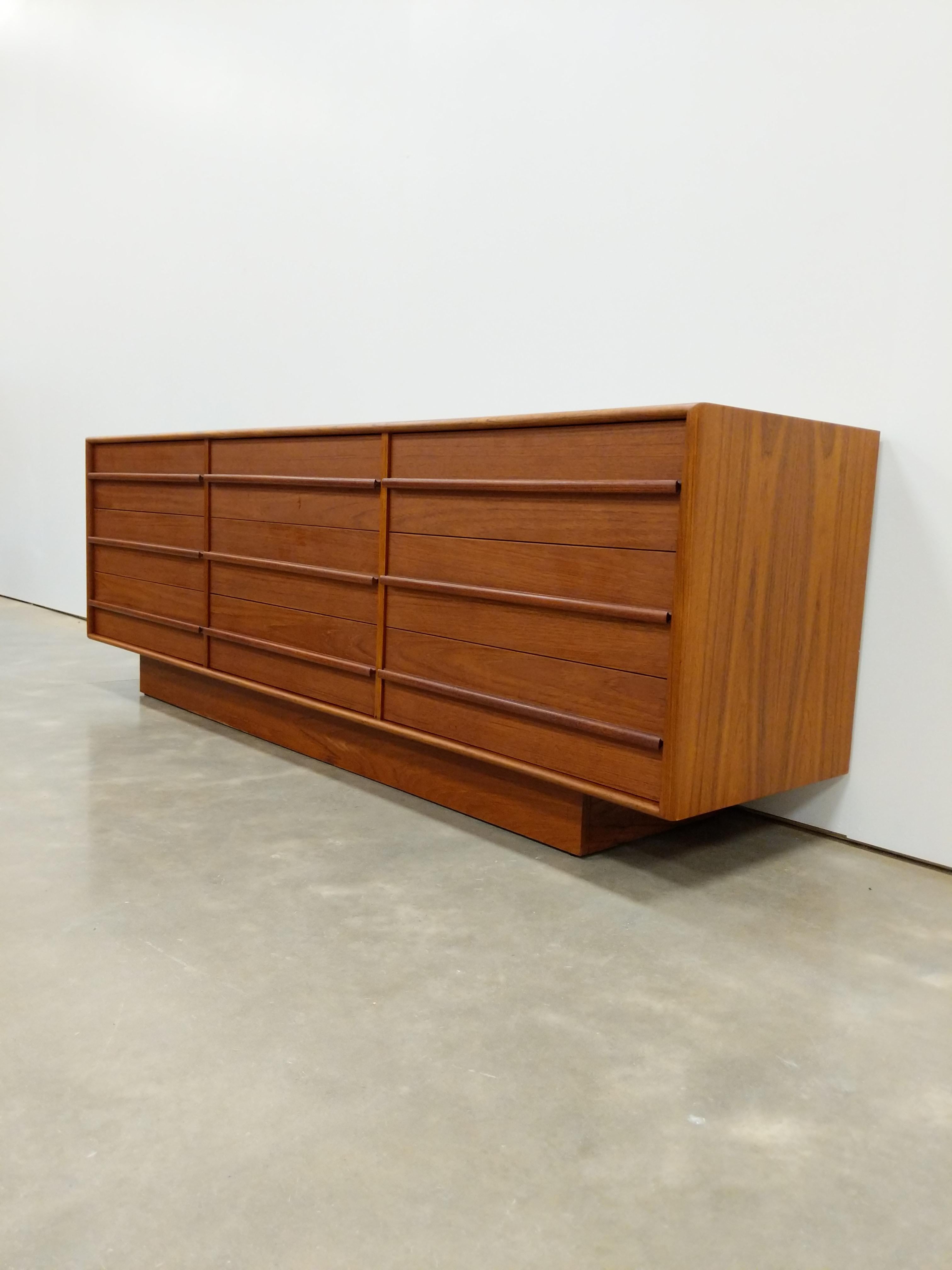 Authentic vintage mid century modern teak low dresser / chest of drawers.

By Inter-Continental-Design.

Maker's label on back.

This piece is in excellent refinished condition with very few signs of age-related wear (see photos).

If you would like