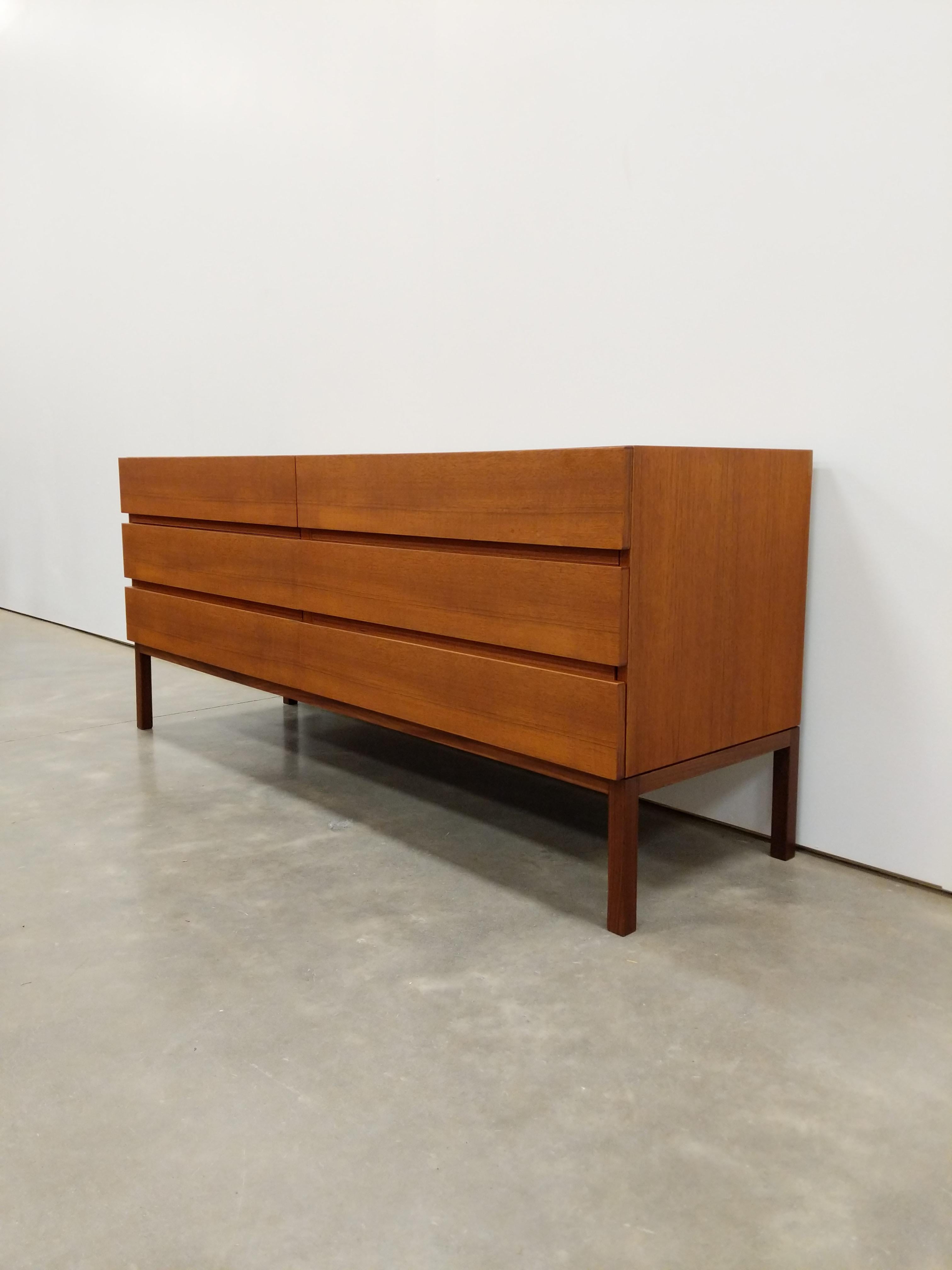 Authentic vintage mid century modern teak low dresser / chest of drawers.

By REFF.

This piece is in excellent refinished condition with few signs of age-related wear (see photos).

If you would like any additional details, please contact