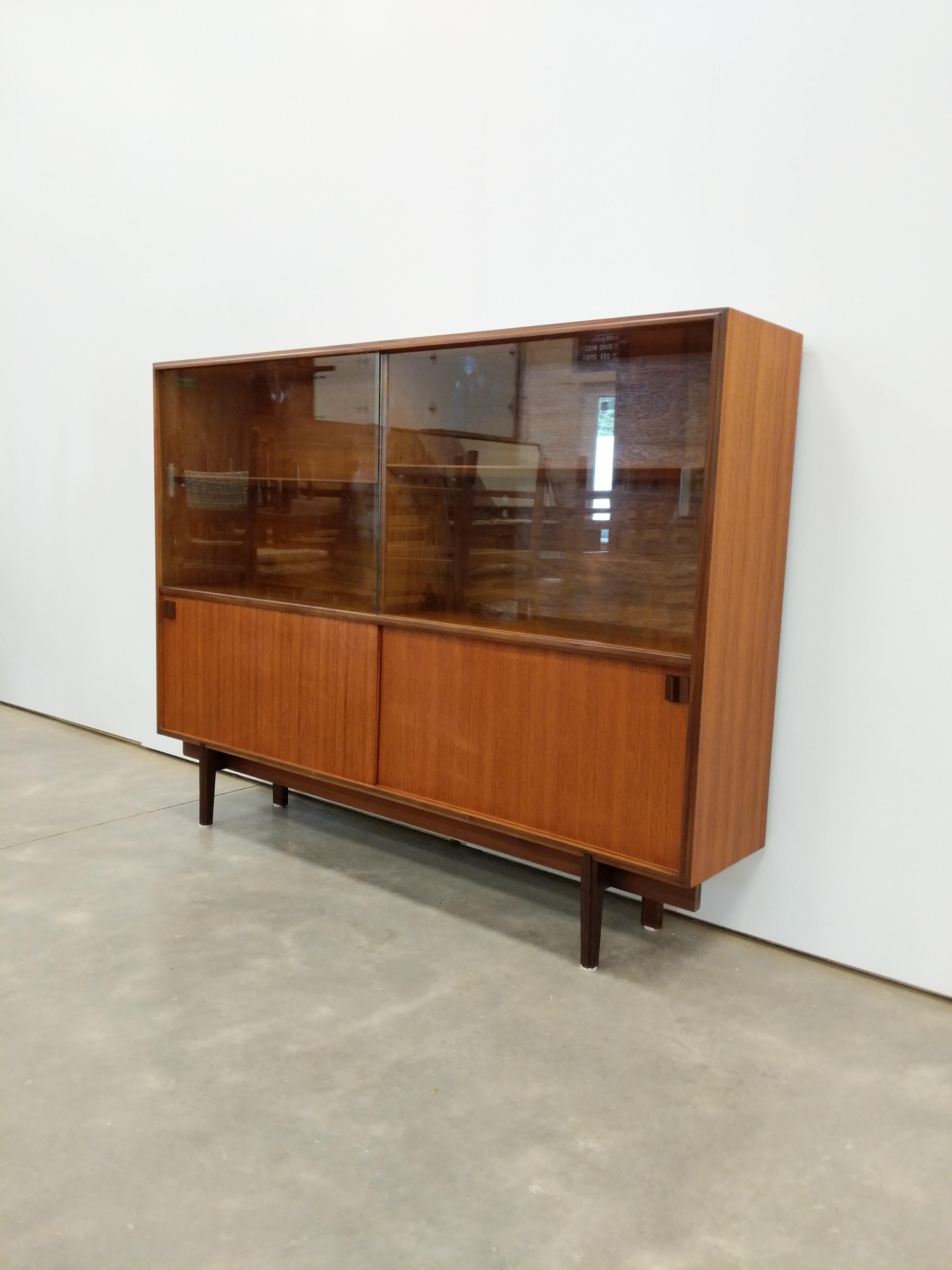 Authentic vintage mid century modern teak cabinet / bookshelf / server / sideboard.

