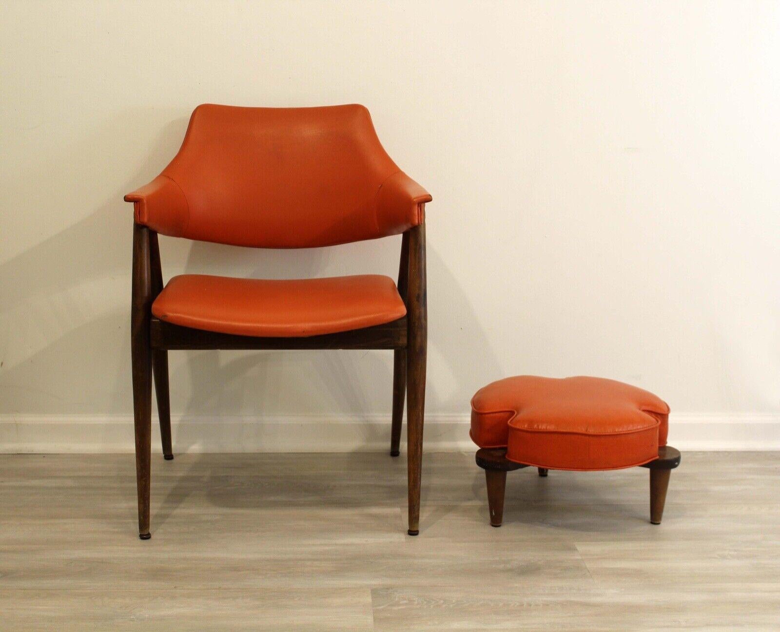 Le Shoppe Too is pleased to present this fantastic orange vinyl armchair with matching ottoman, by Thonet. In good condition with a small tear as shown in the pictures. Dimensions: chair: 23 W x 23 D x 31.5 H arm height: 26