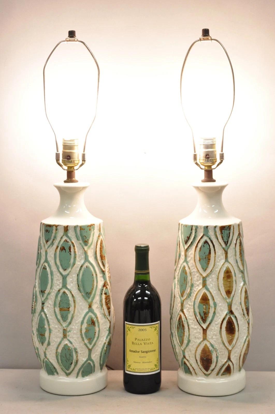 Vintage Mid Century Modern Turquoise Blue/Brown Distress Painted Cream/White Ceramic Table Lamps - a Pair. Circa Late 20th Century. Dimensions : 28