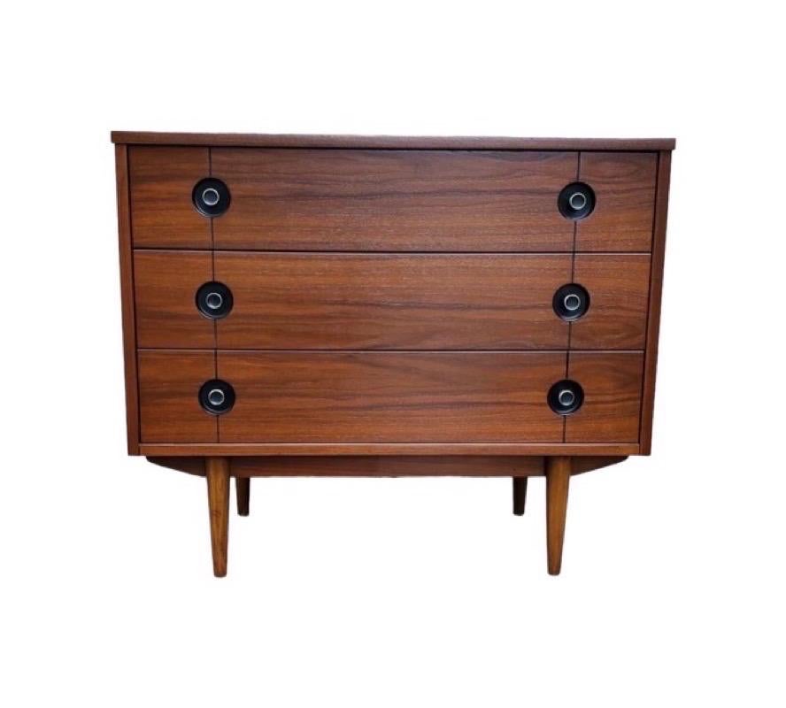 Vintage Mid Century Modern Walnut 3 Drawer Dresser. Original Hardware. Professionally Refinished.

Dimensions   36 W ; 18 D; 30 H