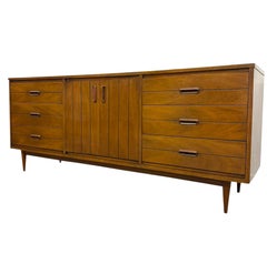 Vintage Mid Century Modern Walnut 9-Drawer Triple Dresser Dovetailed Drawers.