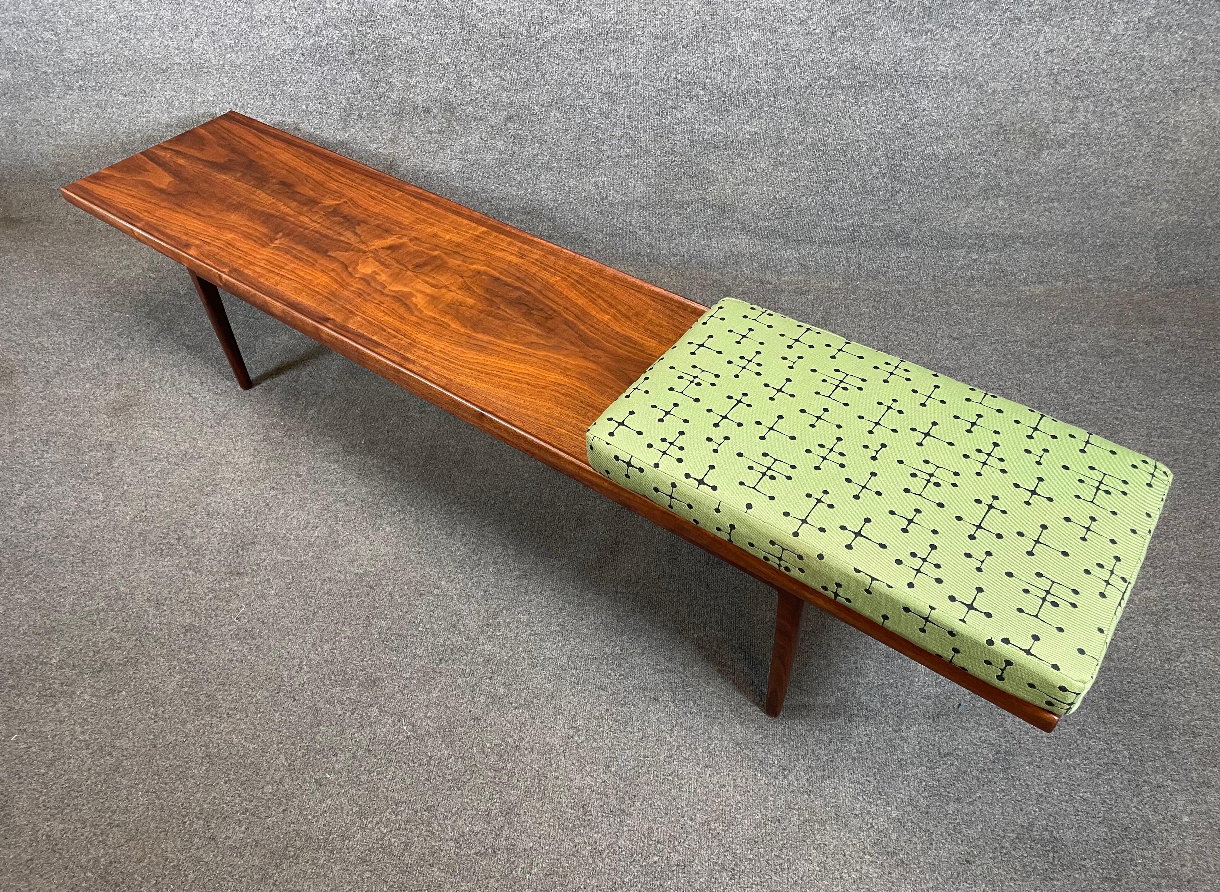 Here is a beautiful mid century modern bench in walnut designed by Kipp Stewart and manufactured by Drexel for the 