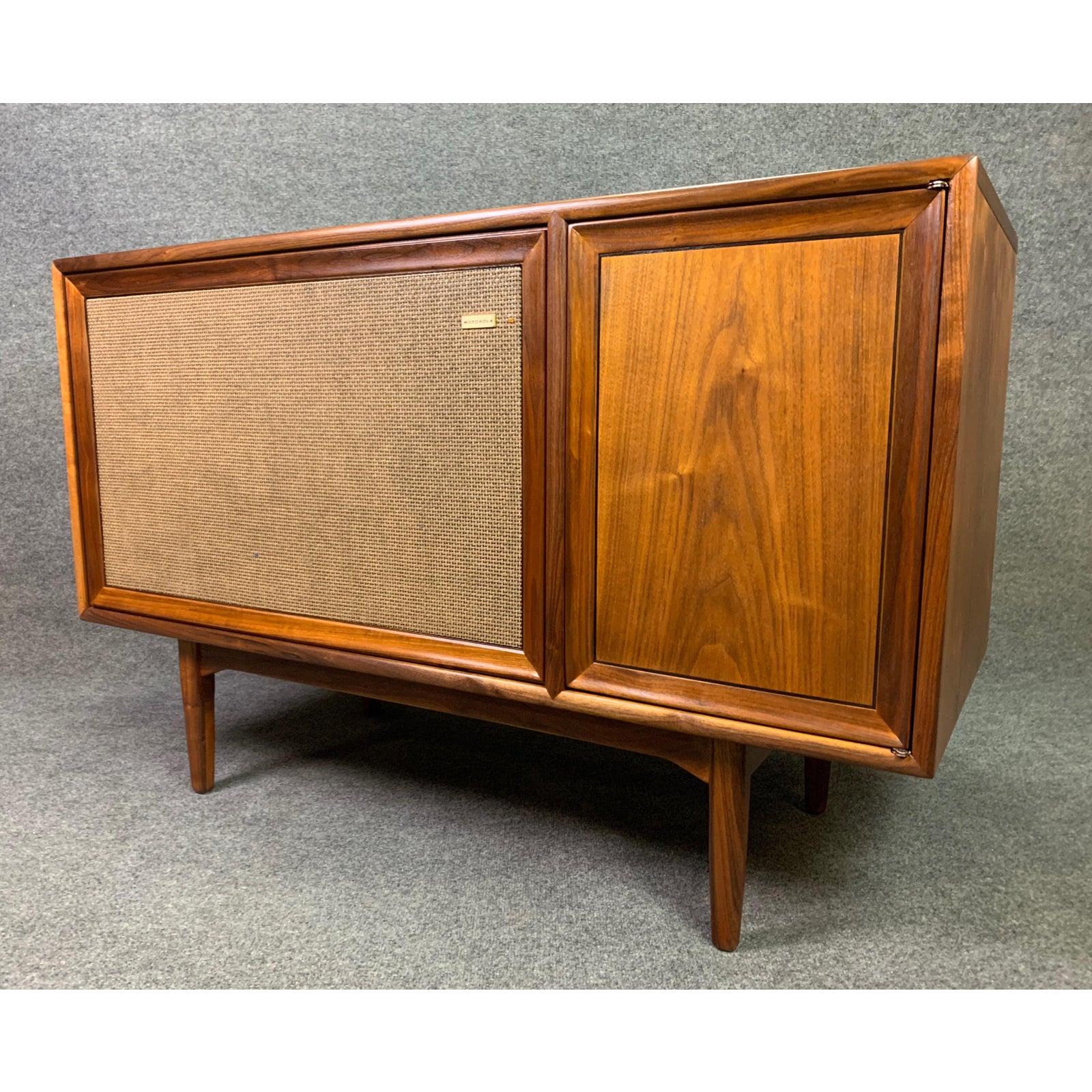 Here is a rare and beautiful midcentury stereo console-cabinet designed by Kipp Stewart and Stewart McDougall from the sought after 