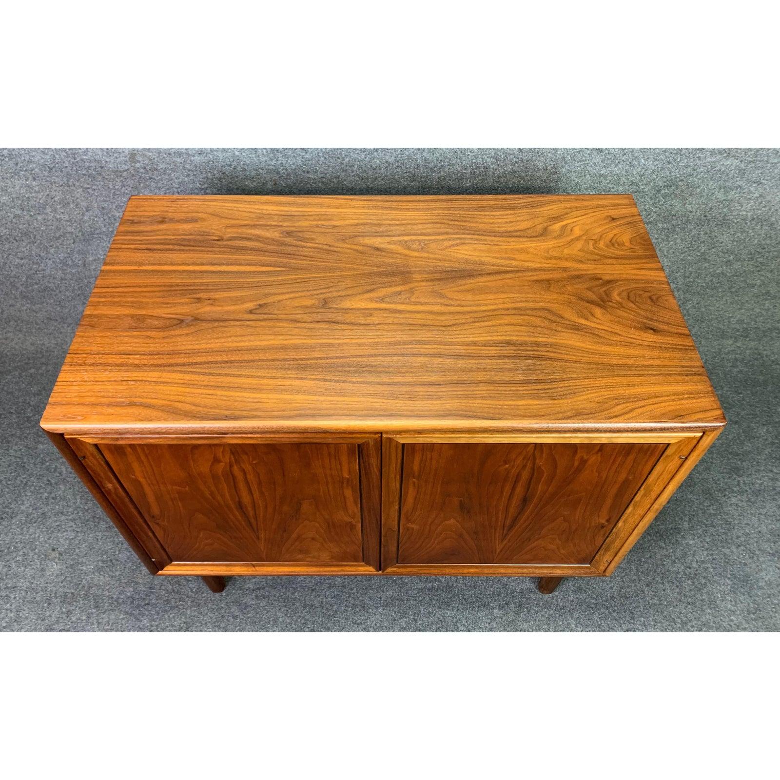 Here is a beautiful MCM cabinet in walnut designed by Kipp Stewart and Stewart McDougall for the sought after 