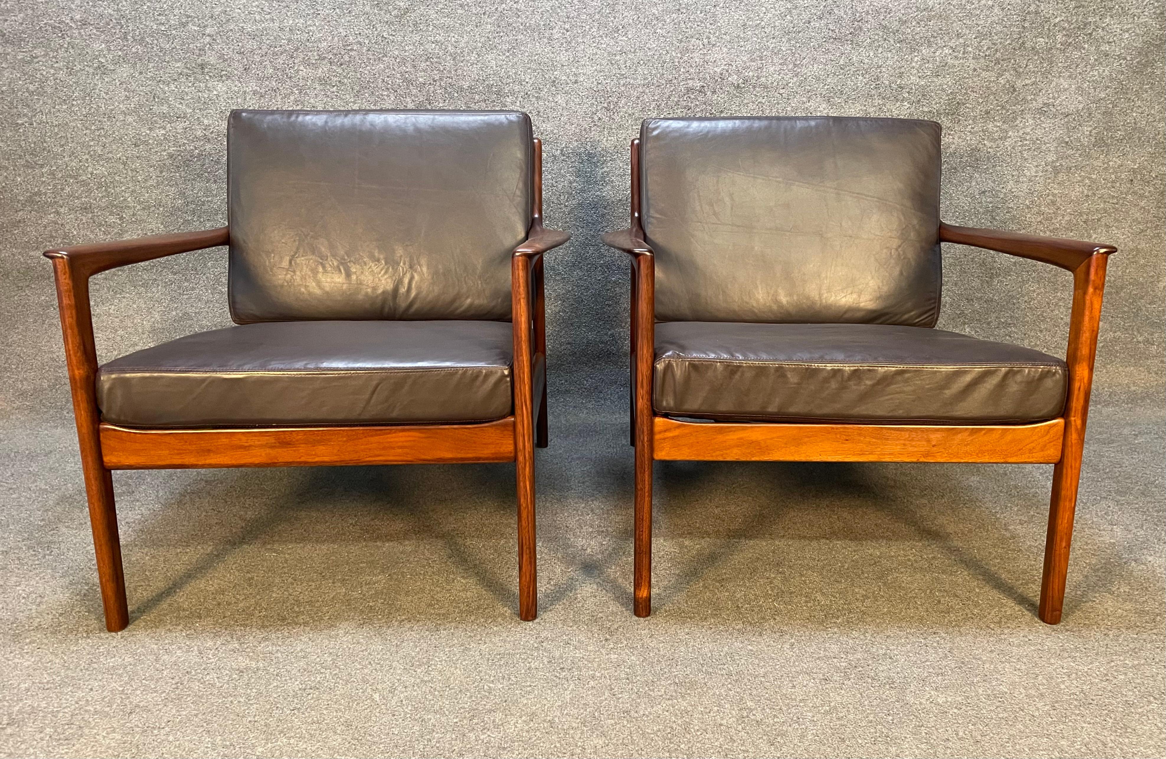 Here is a rare set of two scandinavian modern easy chairs model 