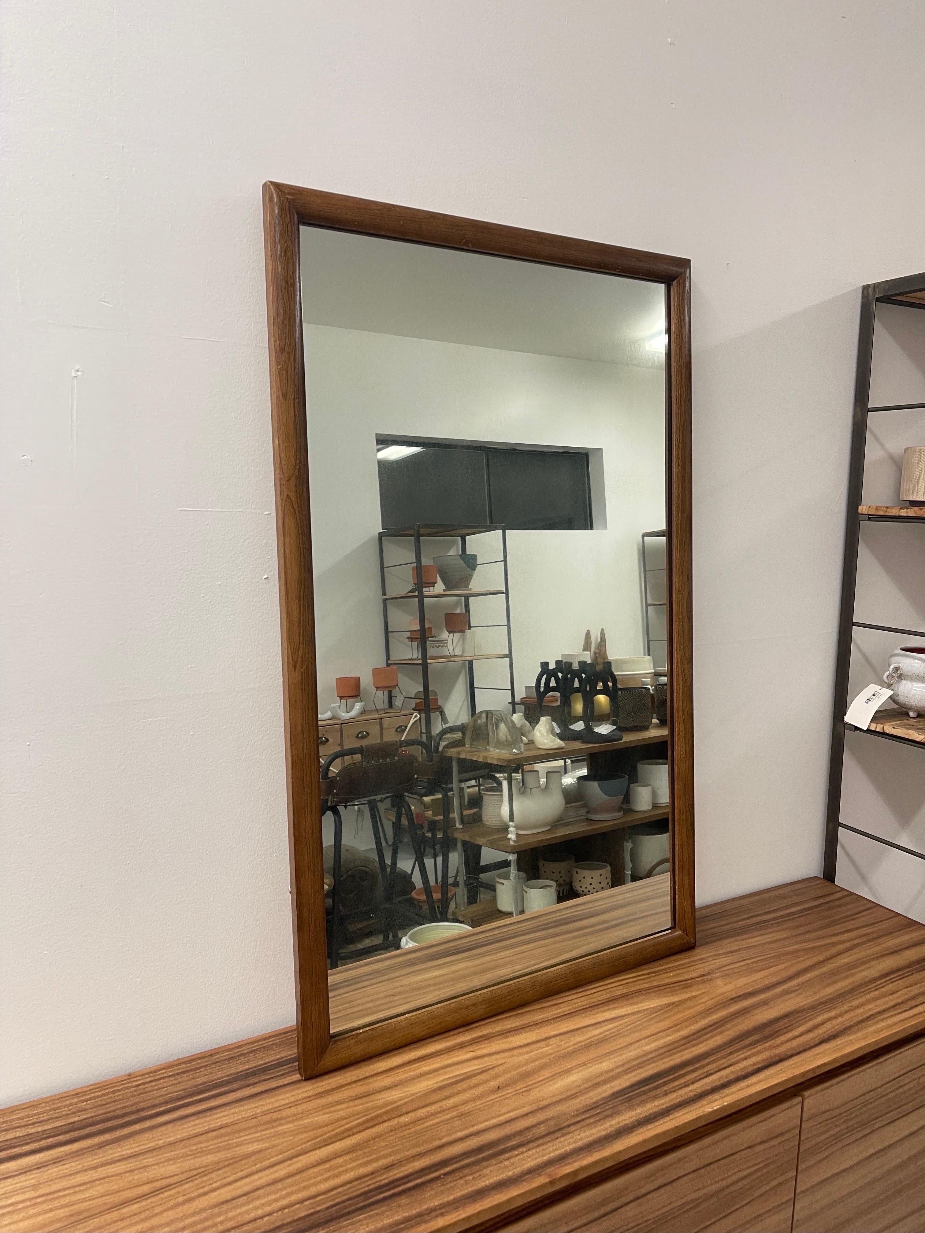 Vintage Mid Century Modern Walnut Framed wall Mirror by Airy Furniture Co.

Dimensions. 26 W ; 42 H