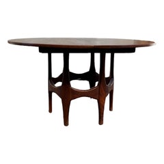 Vintage Mid-Century Modern walnut Round To Oval Extendable Dining Table