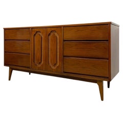 Vintage Mid Century Modern Walnut Toned Credenza with Cane Door Front.