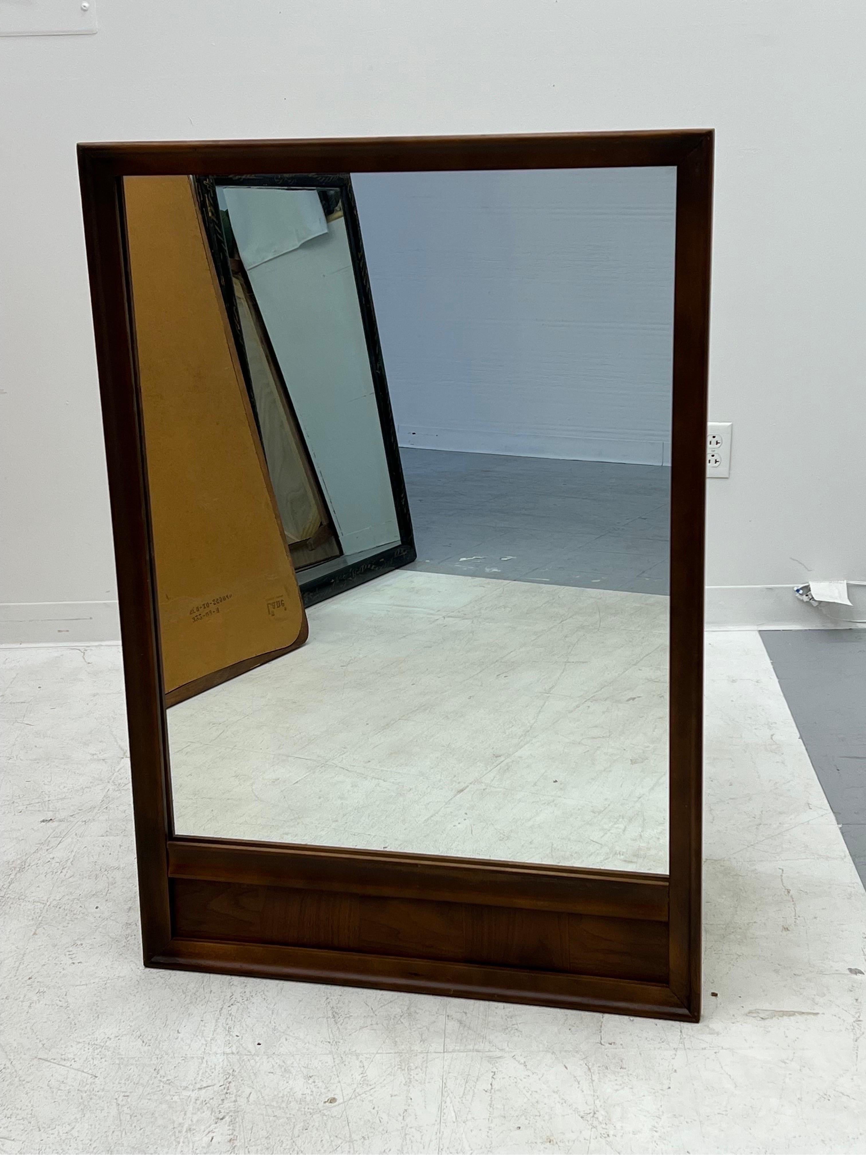 Vintage Mid-Century Modern wood wall mirror 

Dimensions. 30 1/2 W ; 44 H.
