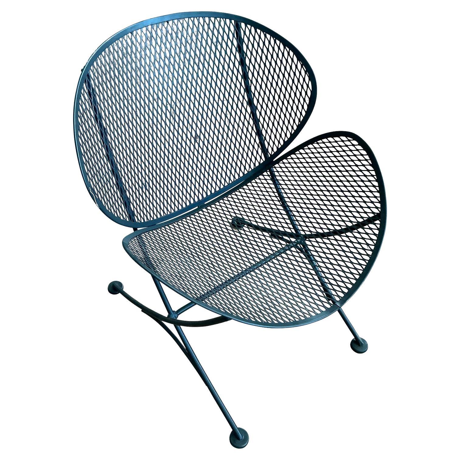 Sillón de hierro forjado de mediados de siglo según Salterini