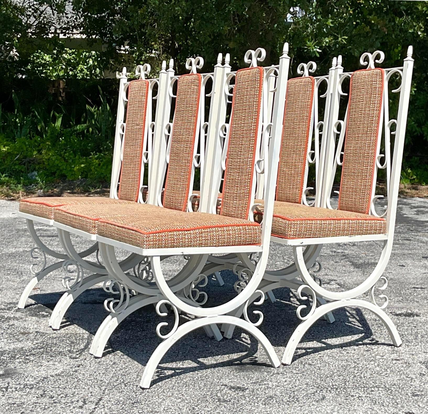 These mid-century modern chairs combine sleek, durable wrought iron frames with plush upholstery, offering both style and comfort. Perfect for adding a touch of retro charm to your dining room, these chairs are a chic and timeless addition to any